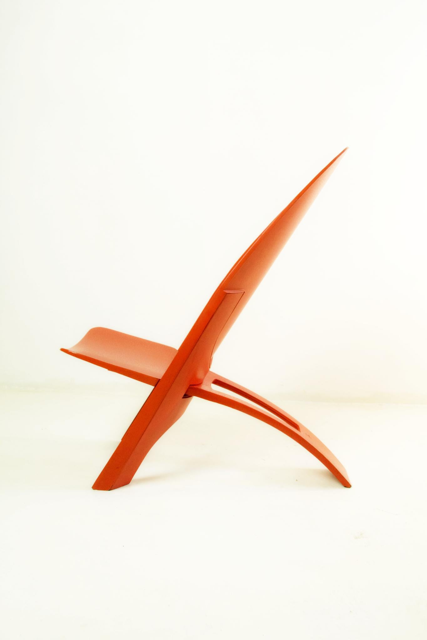 A rare chair designed by Dr. B. Schwarz for Demury design in it´s original orange color. It is a shell chair of molded plastic material with two integrated parts. In good condition with traces of wear. Despite it´s look it is very comfortable and