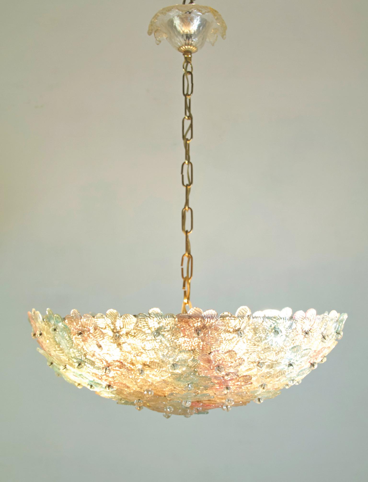 A handmade dome chandelier Murano by Barovier & Toso, Italy and created from glass flowers in clear, blue and pink with gold specs on a metal frame. Uses six E40 lightbulbs. Can be used as a flush mount lamp as well. 

Height with the current