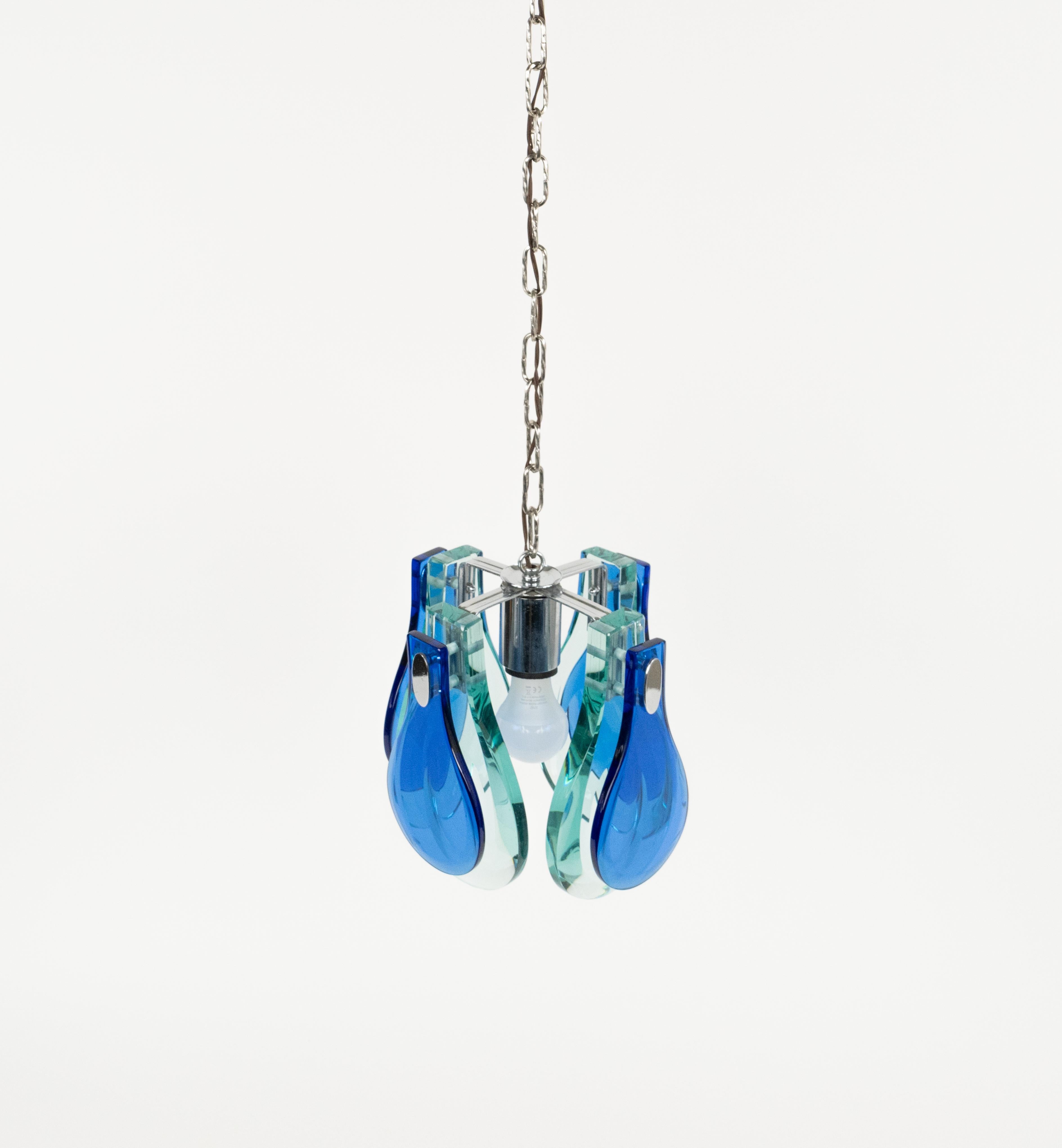 Midcentury amazing chandelier in chrome and  blue and green heavy glass shape of drop by Cristal Arte.

Made in Italy in the 1960s.

The chandelier they wired for the United States or Europe and operate on 110 or 220 Volts.

Measures:  
Height
