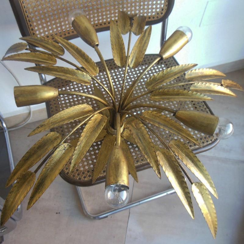 Mid-century chandelier golden leaves handcrafted, wrought iron.
With 5-light.

If you need more information or two lamps you can consult
  They are ideal lamps for low ceilings since they do not go down much, but in high ceilings they are also