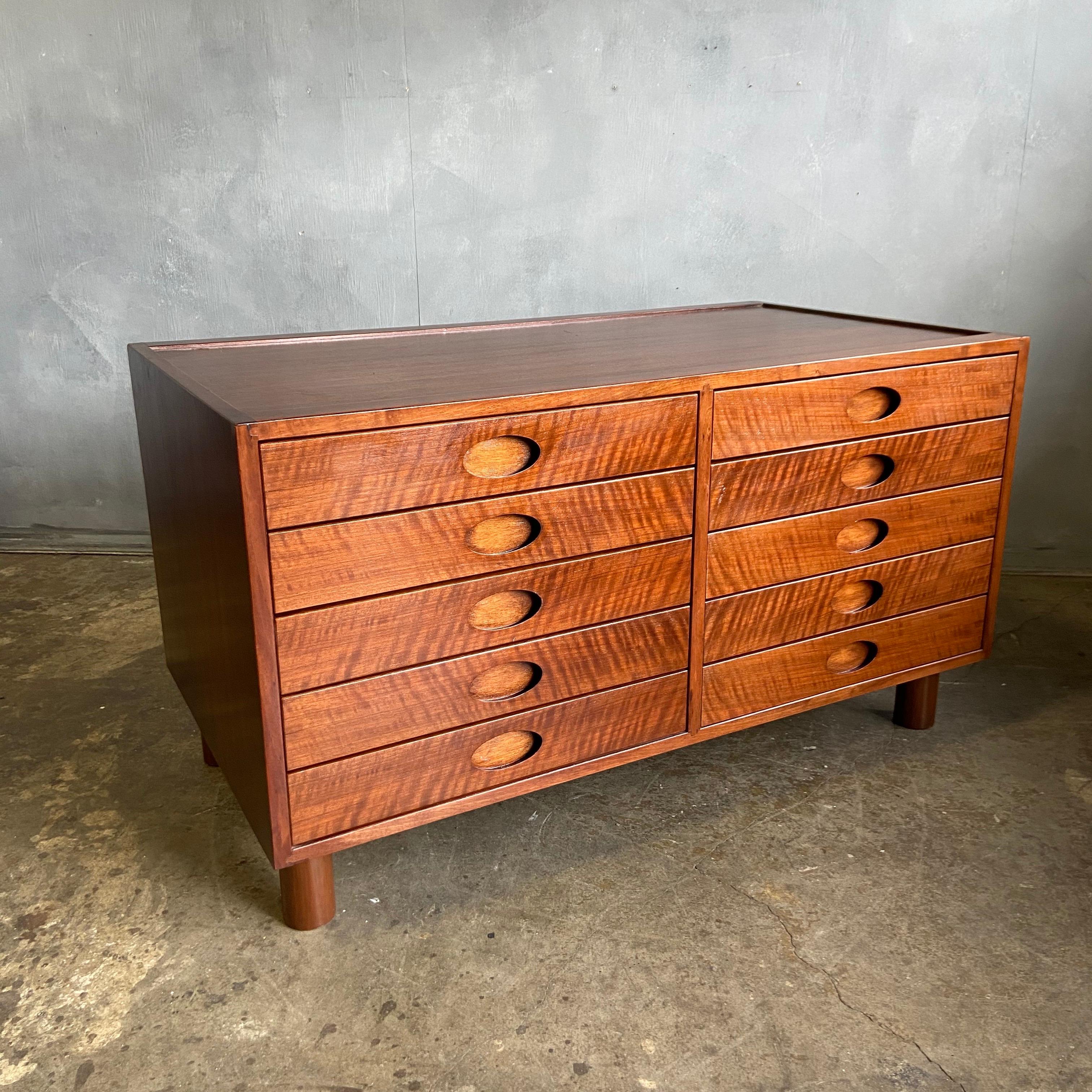 For your consideration is this beautiful 10-drawer dresser featuring high quality craftsmanship with a beautiful wood grain. A very substantial chest in a small package. In original condition with minor imperfections as expected and ready for use.
