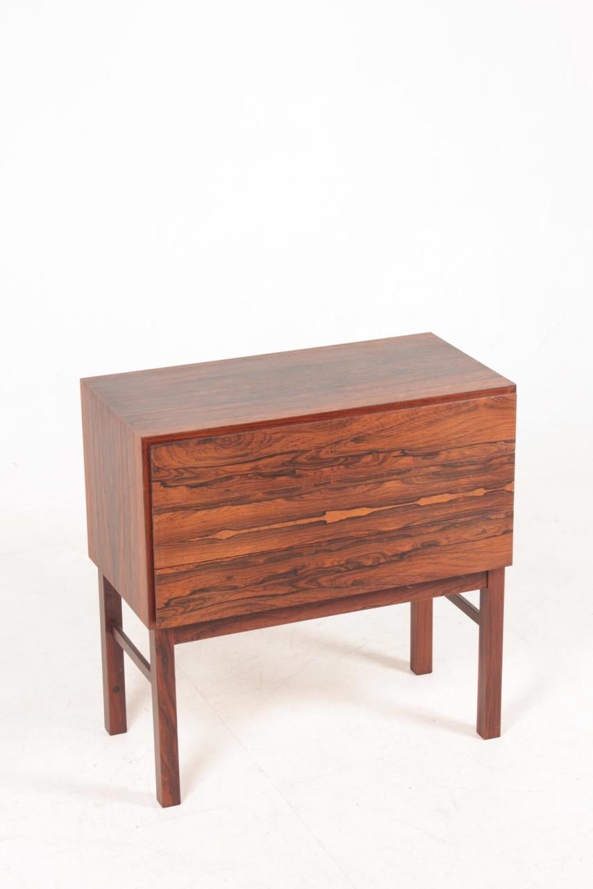 Chest of drawers in rosewood, designed and made in Denmark. Great original condition.