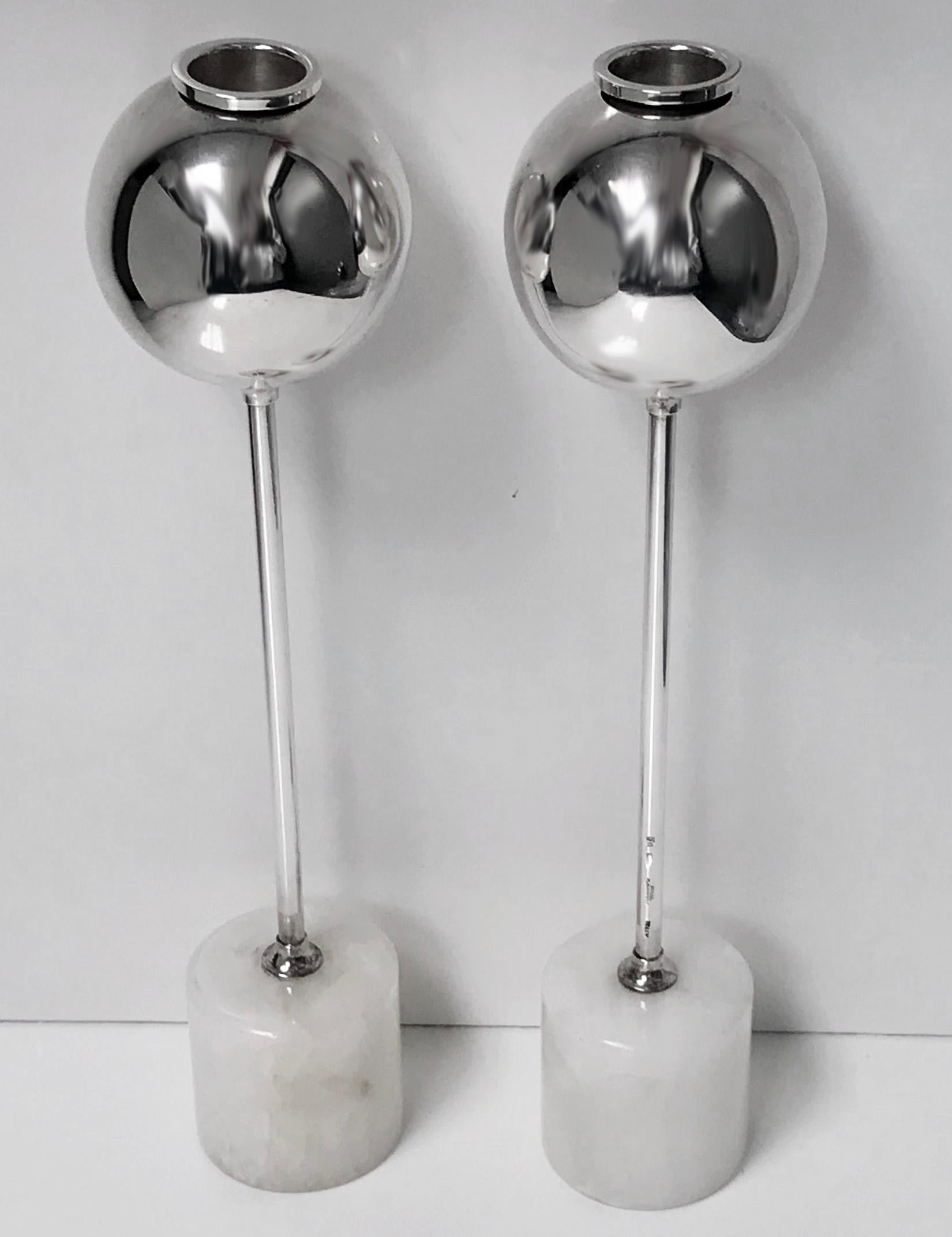 Midcentury Christofle rare design candlesticks, convertible to vases. Each of spherical form on long tubular stems surmounted on white marble cylindrical bases. Stems with full Christofle Gallia marks. Nozzles removable to allow for use as vases.