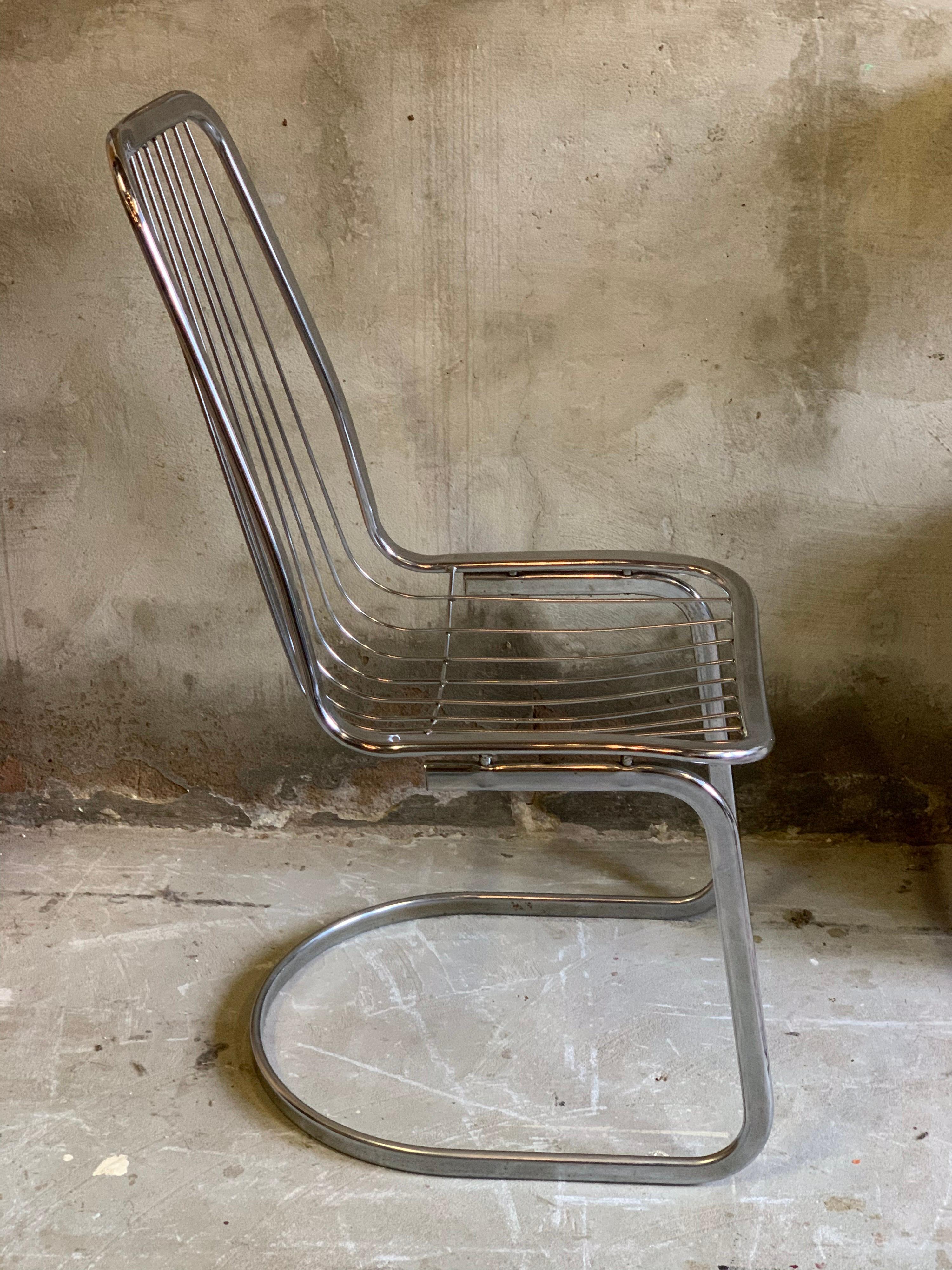 Vintage metal chair, 1970s by Gastone Rinaldi. Neat condition, chrome still good, of course some minor signs of wear. Sit comfortably.

The whole is 101 cm high, 48 cm wide and 57 cm deep. Seat height 46 cm.