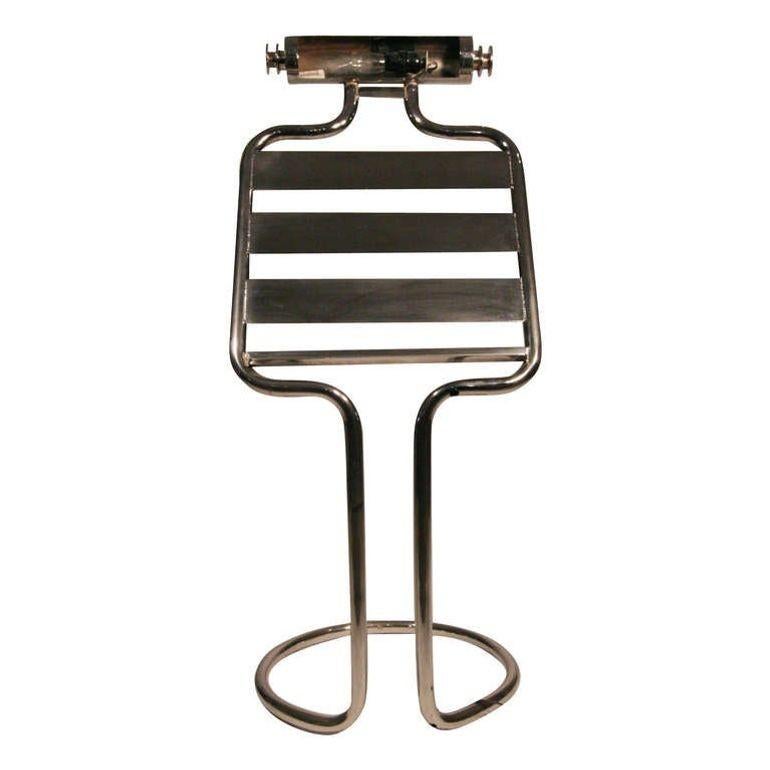 Mid-century chrome sheet music stand. The wonderful stand is made from a solid single piece construction. The piece is wired electrically providing a top light to better read sheet music.