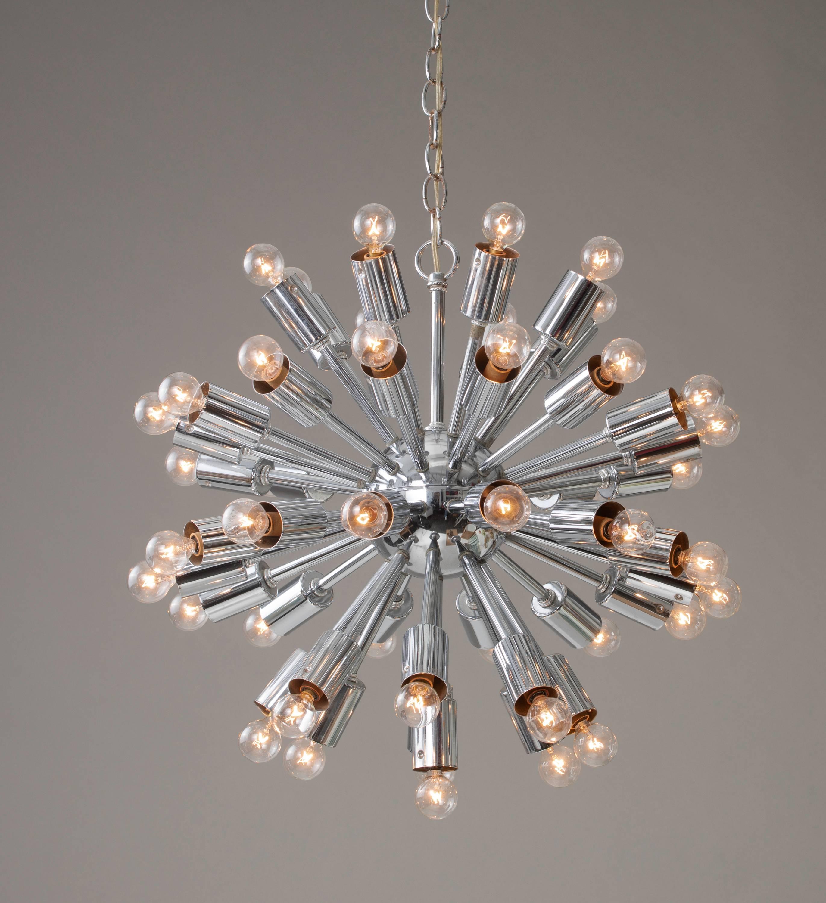1970s authentic midcentury chrome Sputnik chandelier. Measure: 24” round, 42 lights. Classic Sputnik style.
 