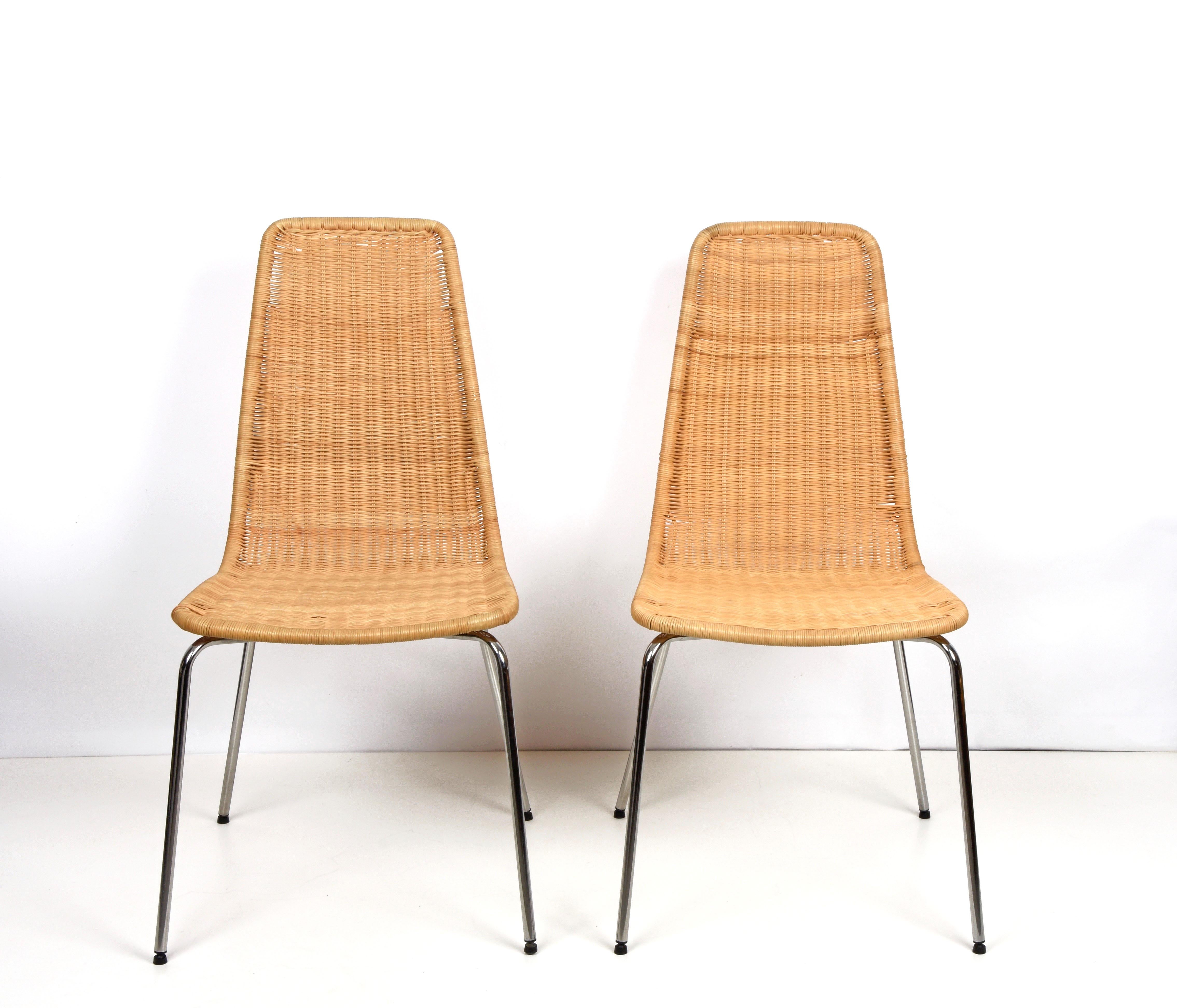 Beautiful midcentury set of four wicker and chromed metal Italian chairs with removable rattan seat. These amazing pieces were produced in Italy during the 1970s and attributed to designers Franco Campi e Carlo Graffi.

 Each chair has articulated