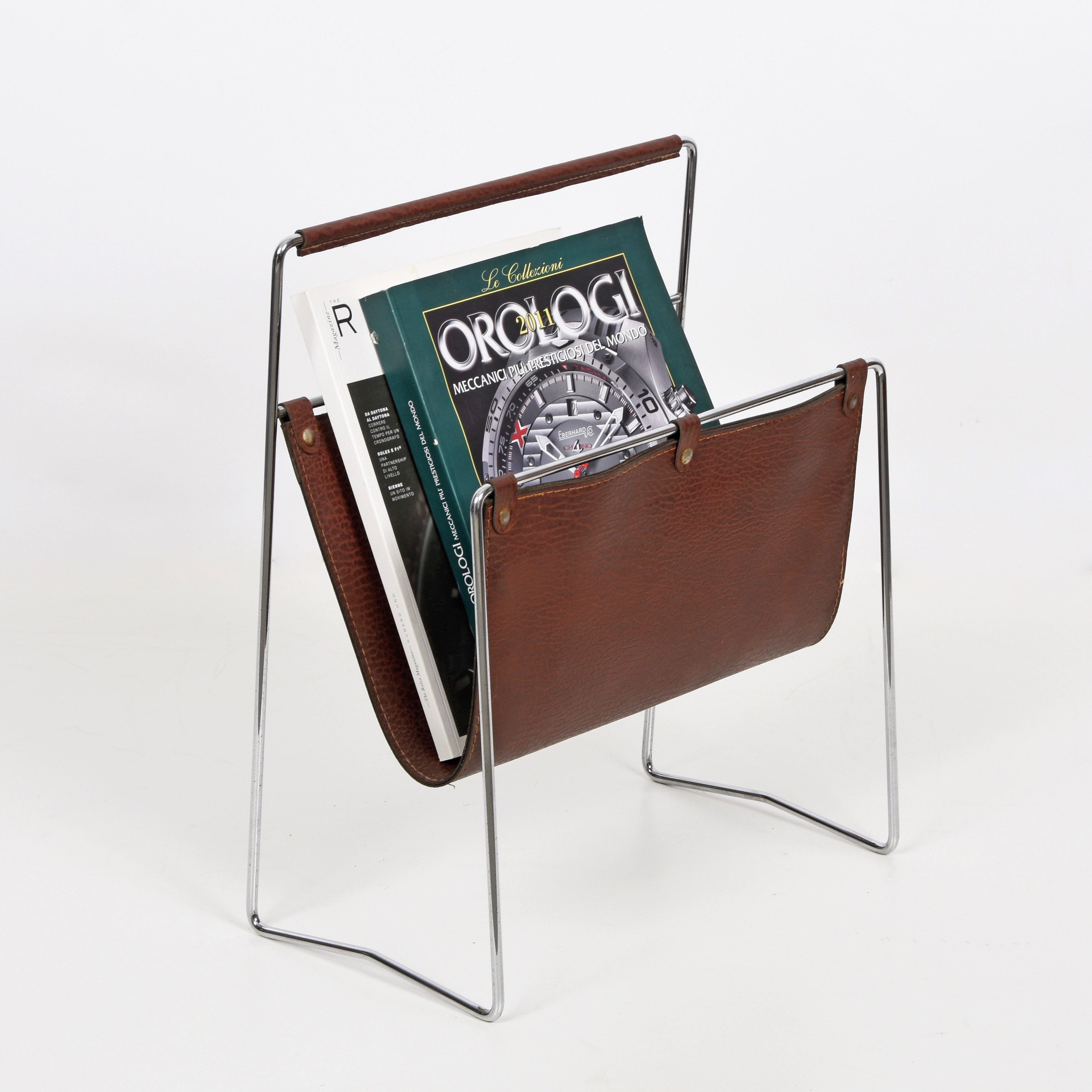 Magazine rack in chromed steel and leather produced in France during 1970s in the style of Jacques Adnet.

Luxury accessory in very good condition, ideal for any modern environment or office. The item is not too heavy and easily movable, with a