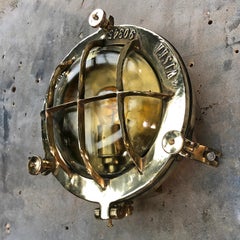 Midcentury Circular Industrial Cast Brass Circular Wall Light with Glass Dome