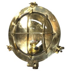 Mid-Century Circular Industrial Cast Brass Circular Wall Light with Glass Dome
