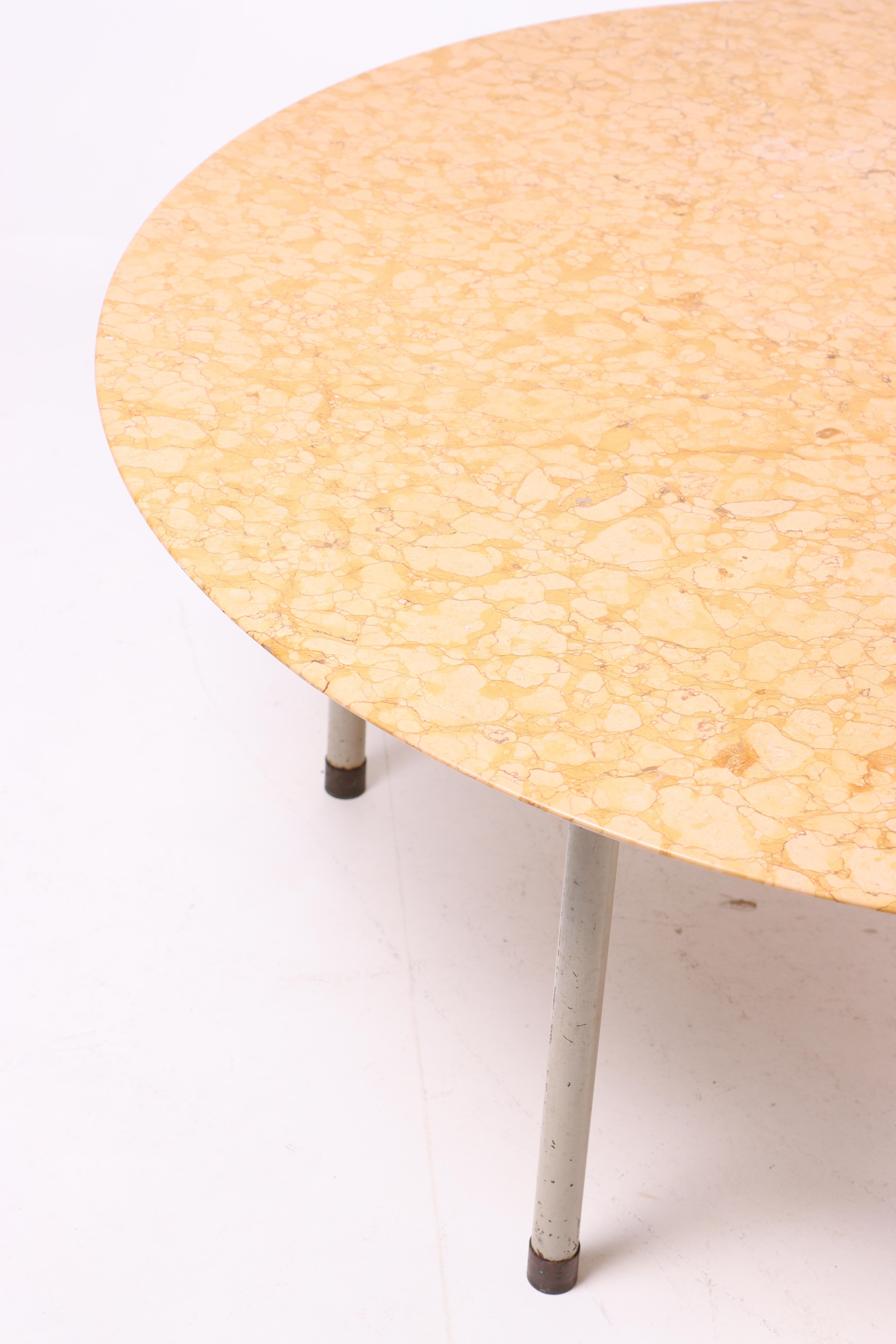 Scandinavian Modern Midcentury Circular Low Table with Red Verona Marble Top by Acton Bjørn. For Sale