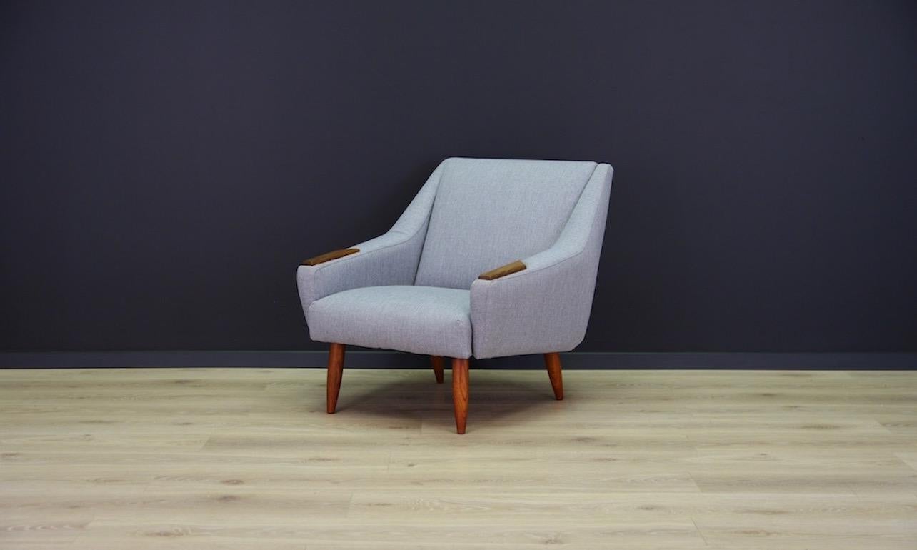 Retro armchair from the 1960s-1970s. Beautiful straight line, Scandinavian design. Armchair upholstered with the new fabric. Teak armrests. Preserved in good condition, directly for use.

Dimensions: Height 73cm, width 73cm, seat height 36cm,