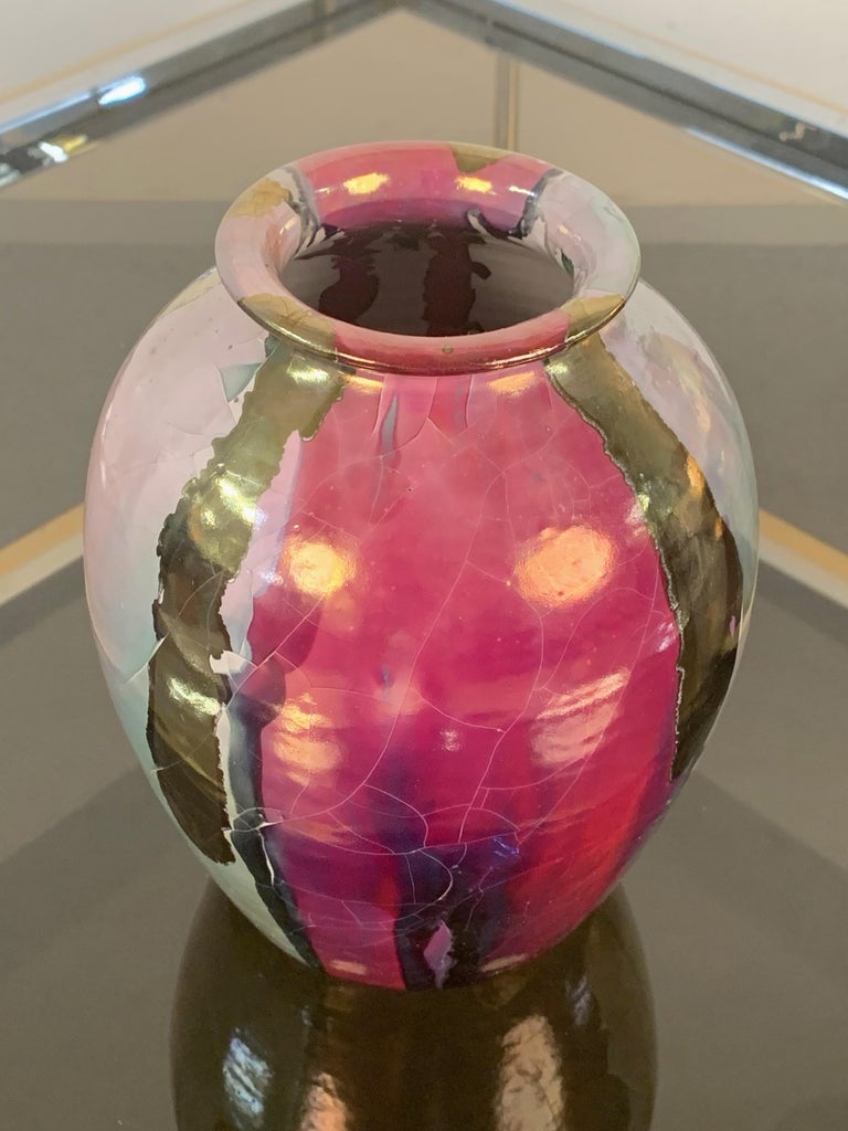 This polychrome ceramic vase is a marvelous production by Claudio Pulli, one of the greatest Sardinian artists of the 20th century.

The vase was produced for I.S.O.L.A. and is made of enameled ceramic, colored with nail polish with metallic