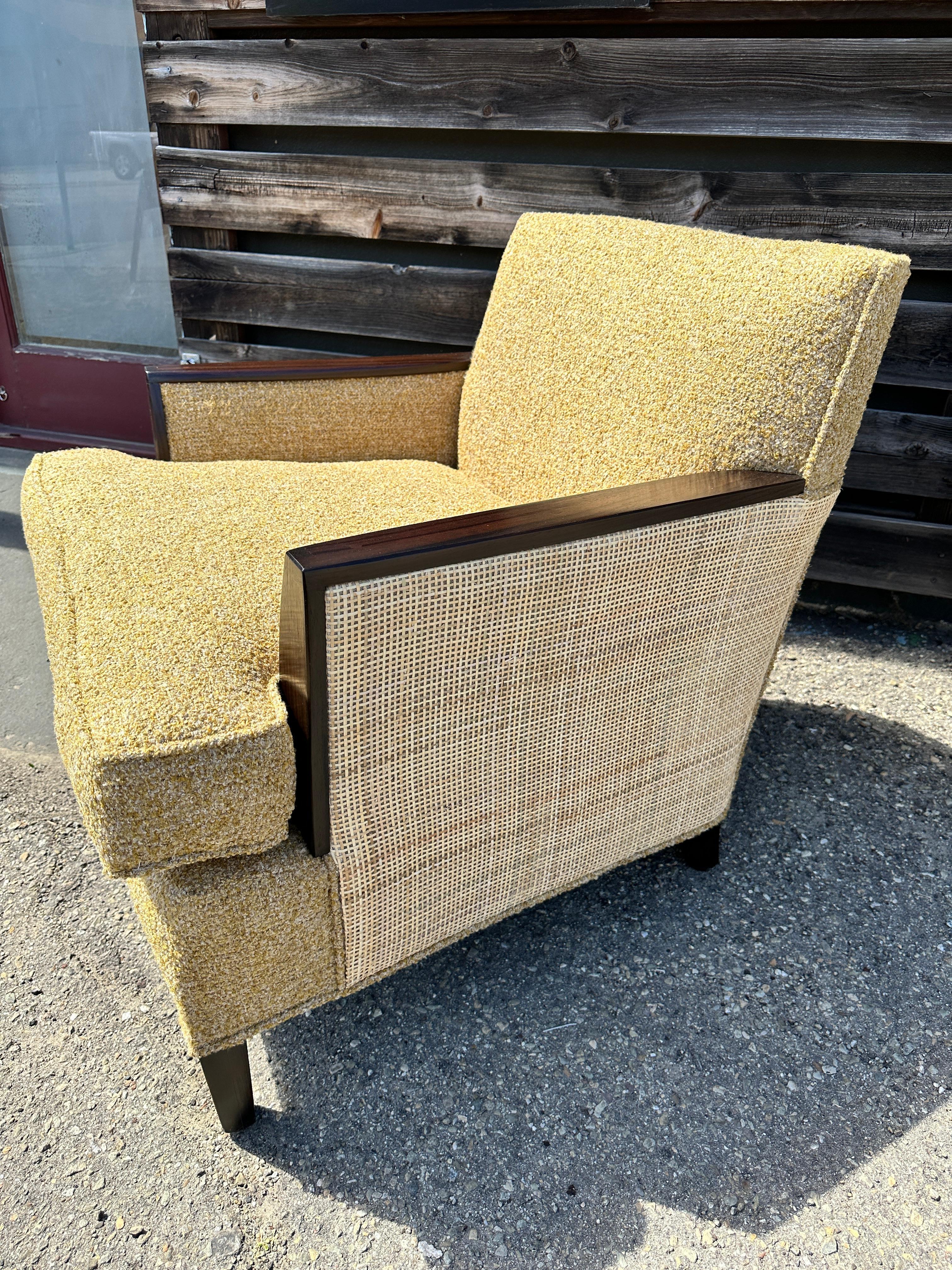 midcentury club chair in boucle and wicker with walnut arms