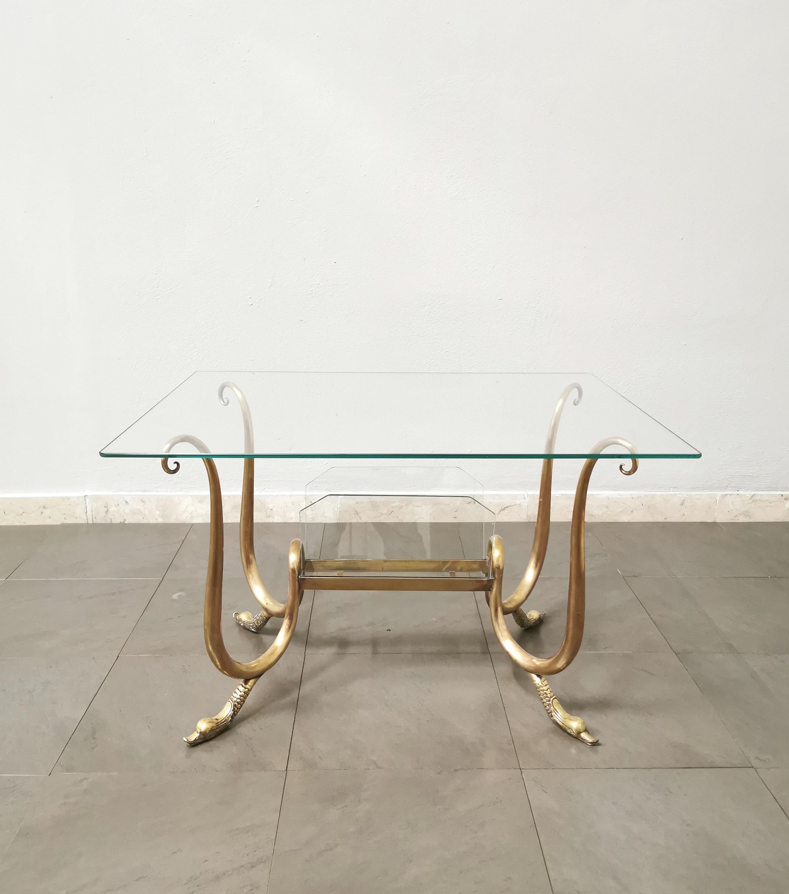 Coffee table or sofa, curved brass structure with swan head-shaped legs and rectangular transparent glass top. Made in Italy in the 40's / 50's.