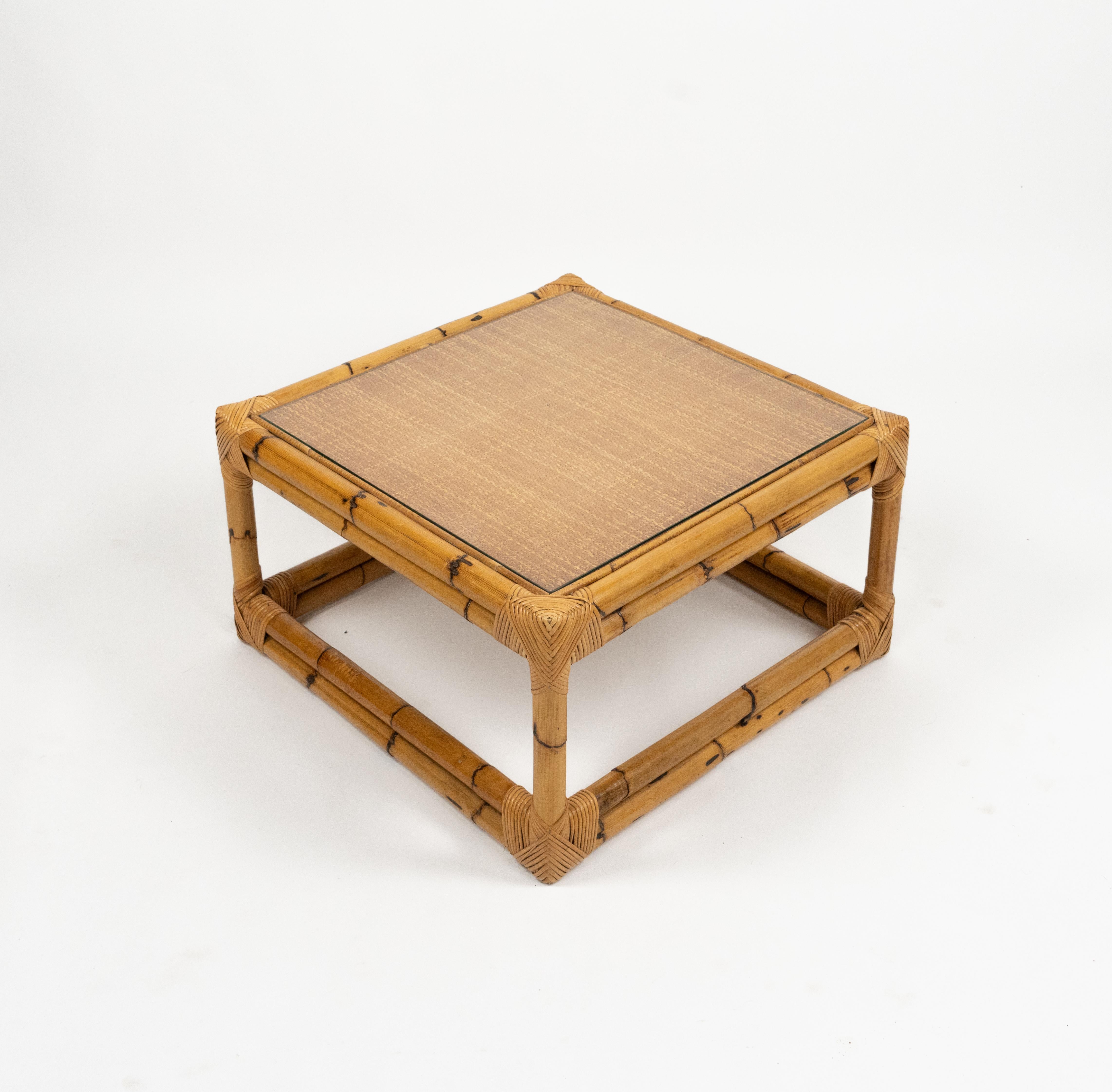 Midcentury beautiful squared coffee table in bamboo, rattan and top glass in the style of Vivai Del Sud. 

Made in Italy in the 1970s. 

Vivai del sud, Gabriella Crespi and Arpex were the three leading design studios in 1970s Italy specialized in