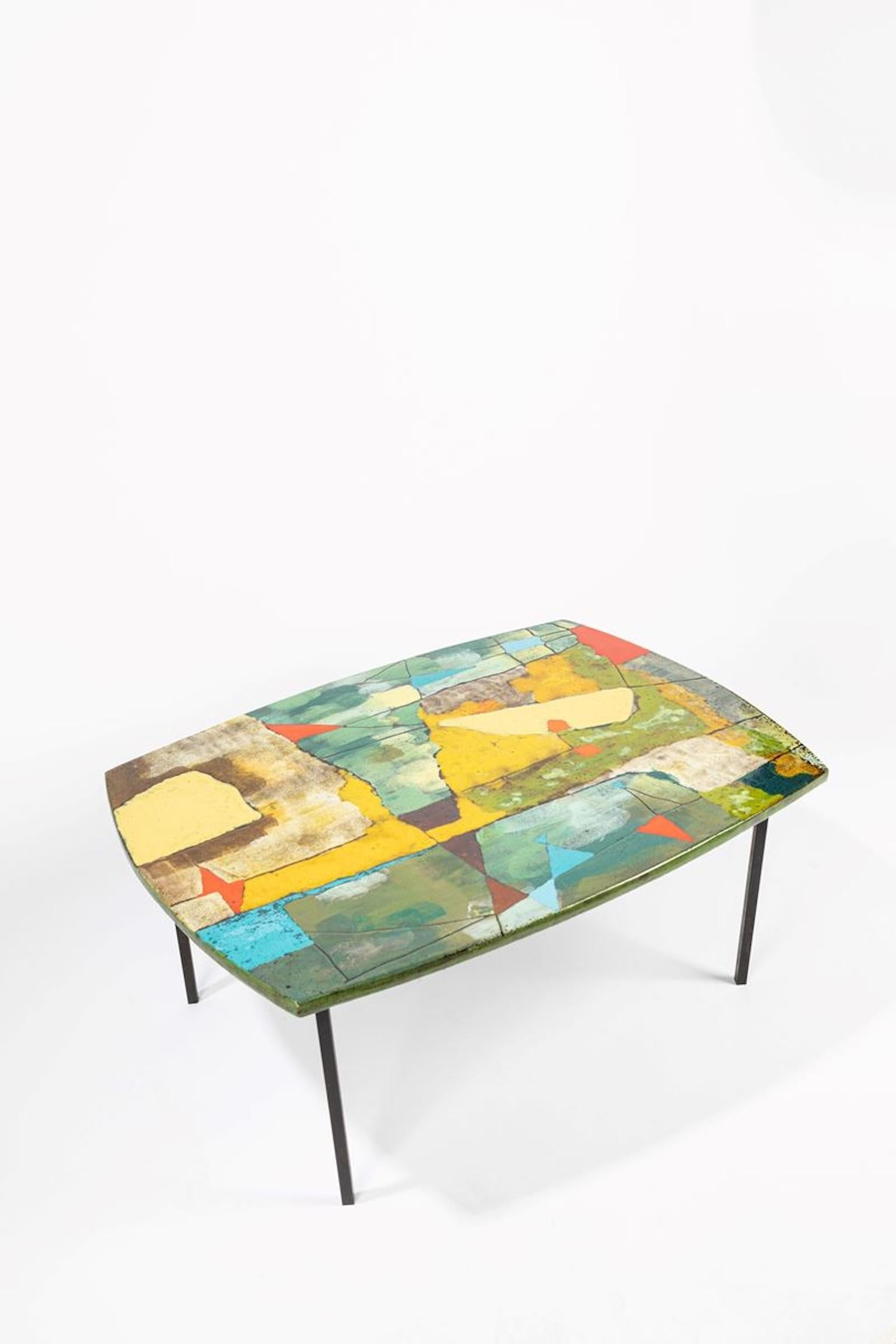 Coffee table with iron structure and glazed ceramic top by Victor Cerrato, 1950. Unique piece.

Biography
The sculptor and ceramist Victor (Vittorio) Cerrato, born in Cunico d'Asti in 1917, opened a ceramic workshop in some rooms in the Valentino