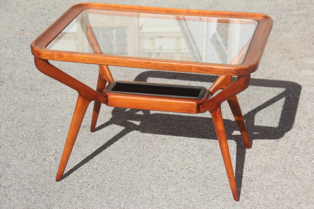 Midcentury coffee table cherrywood rectangular form glass top 1950s Dassi.