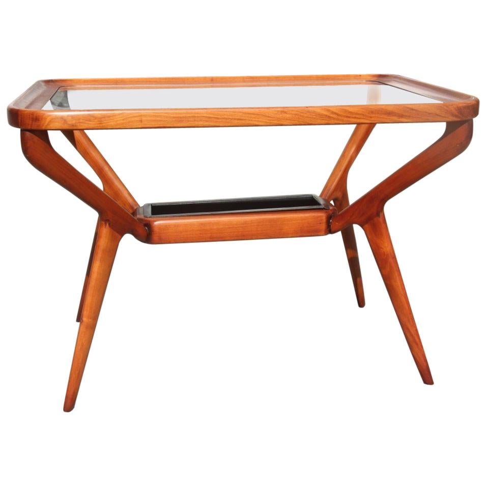 Table basse du milieu du siècle dernier en bois de cerisier avec plateau en verre de forme rectangulaire Dassi des années 1950