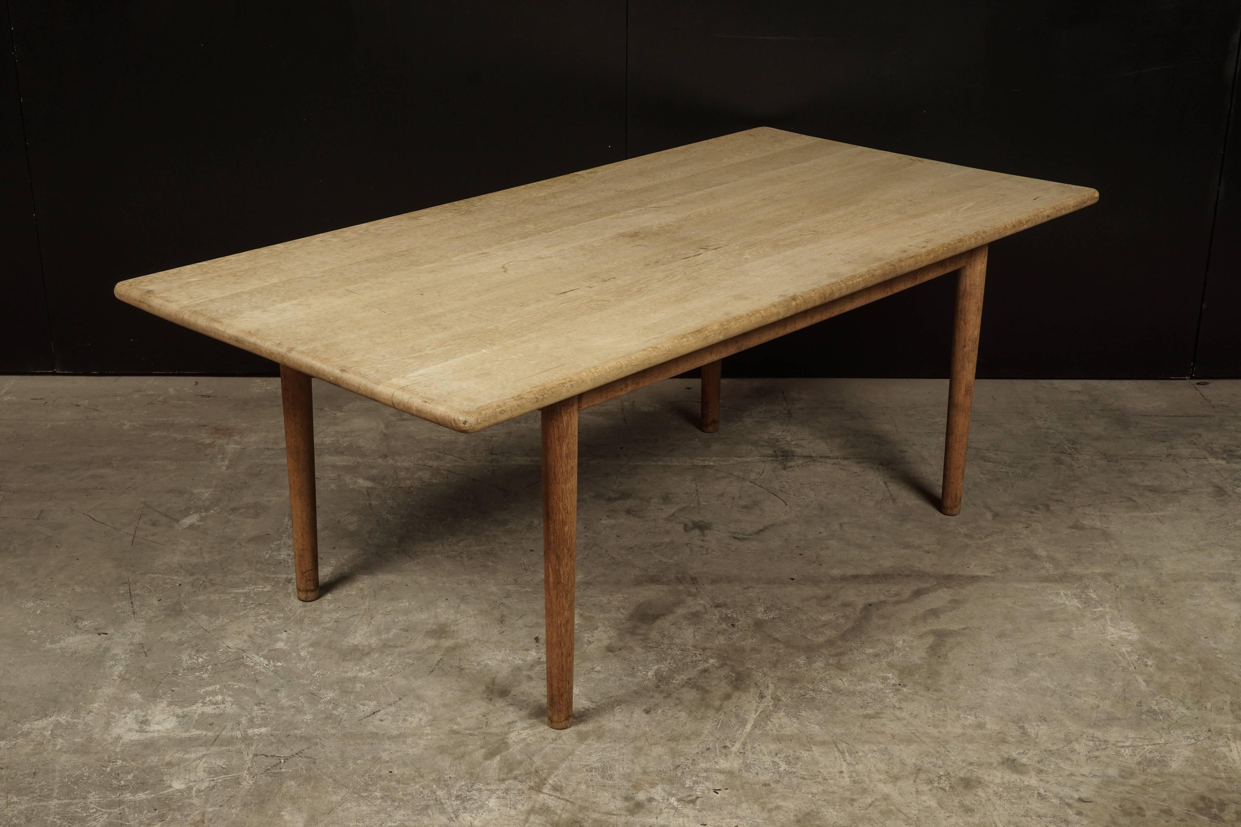 Midcentury coffee table designed by Hans Wegner, circa 1960. Manufactured by GETAMA, Denmark. Solid oak construction. Manufacturer's mark underneath.