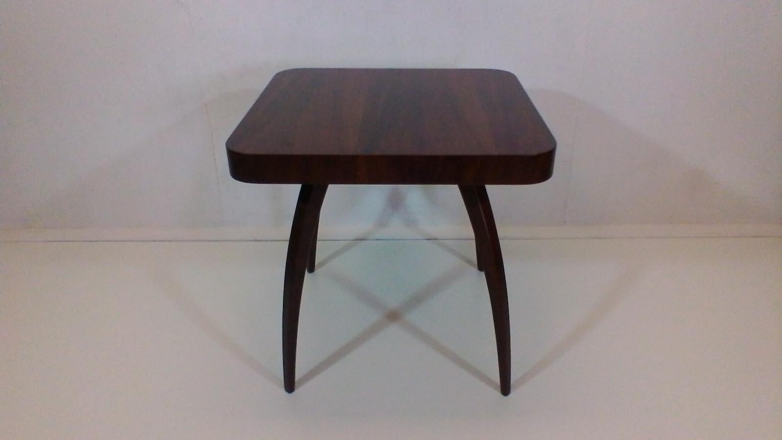 Made in Czechoslovakia. Wooden construction, top plate of veneer. The item is after complete renovation, it has high quality polyurethane varnish.