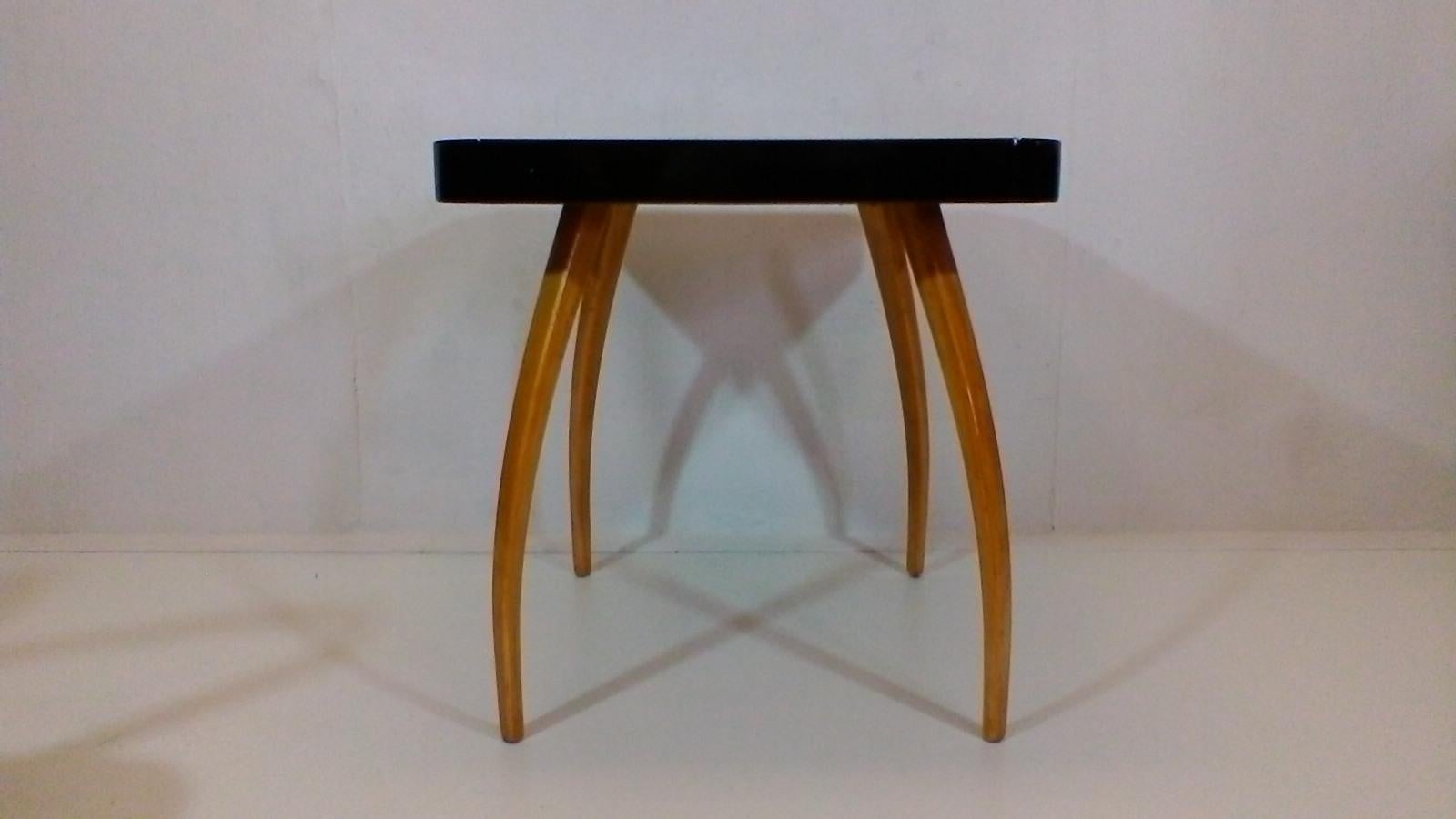 Made in Czechoslovakia. Wooden construction, legs is made of light beechwood and varnished polyurethan varnish. Upper surface is varnished black quality polyurethan varnish. The item is after complete renovation.