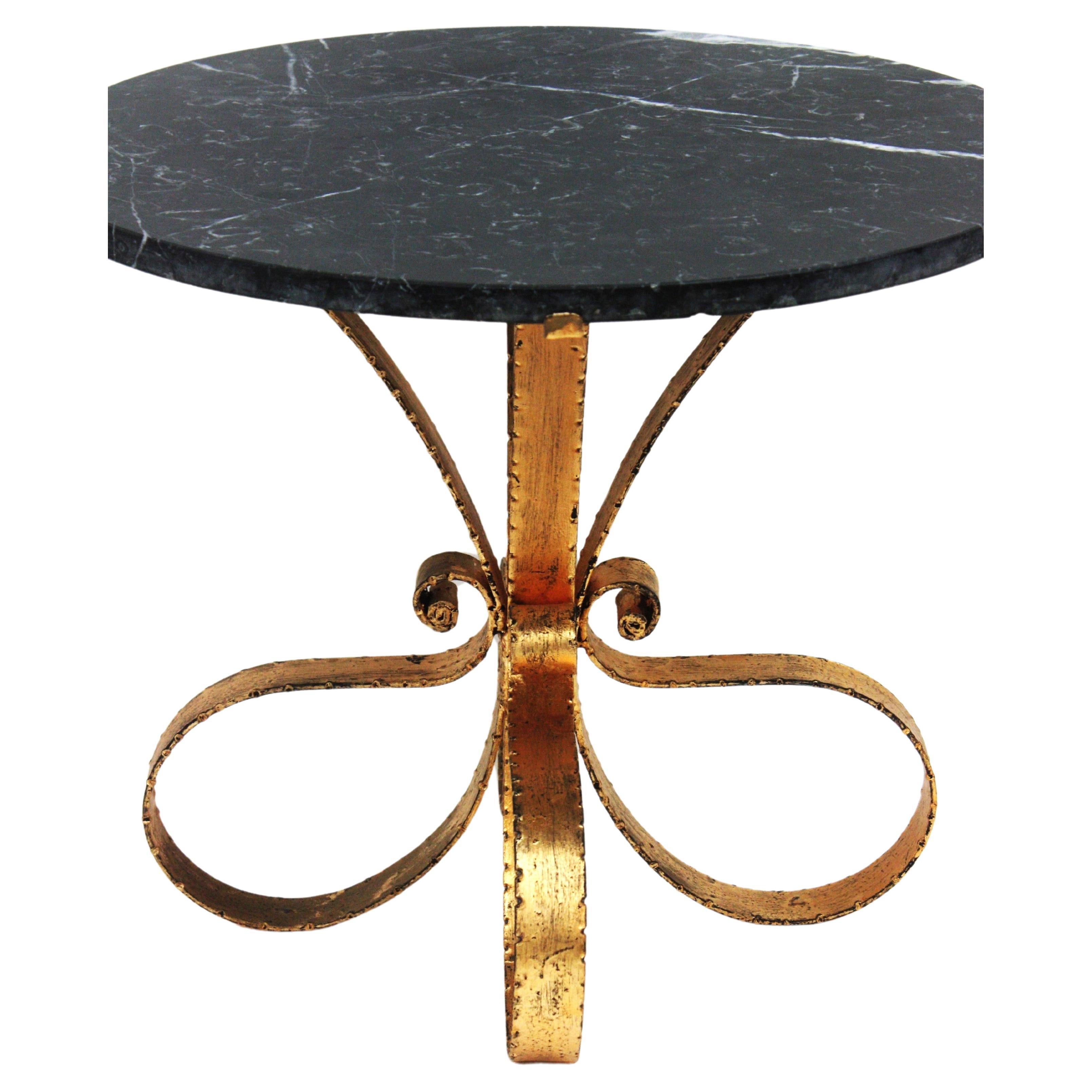 Hollywood Regency Midcentury Coffee Table with Black Marble Top and Hand Forged Gilt Iron For Sale