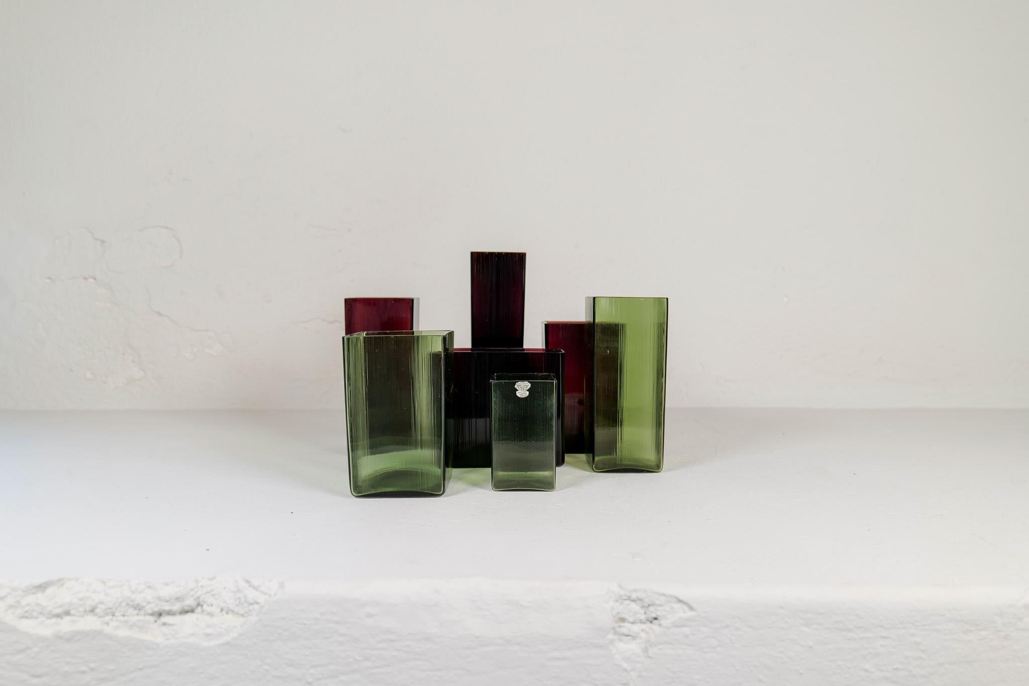 This collection of Seven vases were made at Gullaskruf in Sweden 1960s and designed by famous Lennart Andersson. Because of their shape they were named Isi, which translates to Ice. Different colors of the vases that together gives a nice