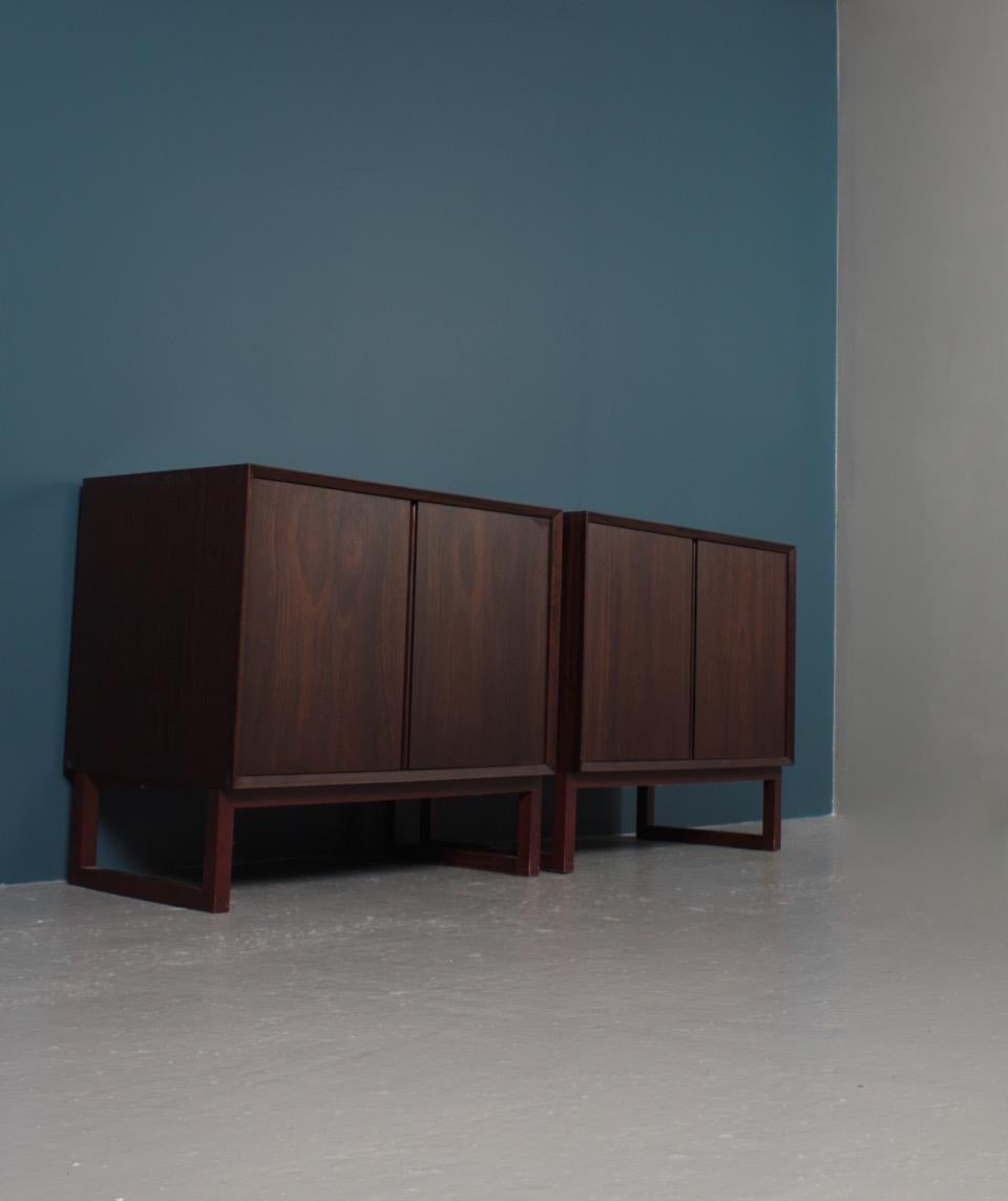 Pair of cabinets and commode in mahogany. Designed and made by Poul Cadovius cabinetmakers in 1960s.
