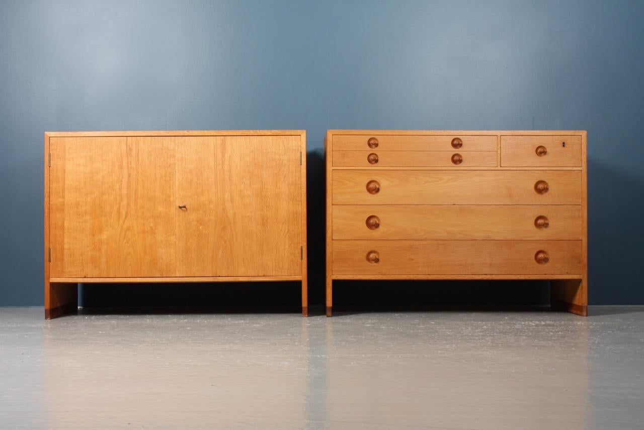 Cabinet and commode in oak. Designed by Hans J Wegner for RY Moebler cabinetmakers in 1960s.
