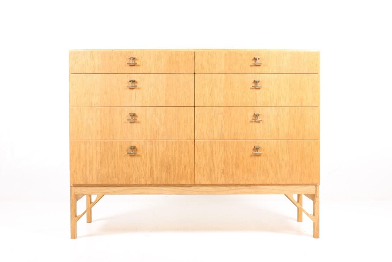 Commode in Scandinavian oak with hardware in brass. Designed by MAA. Børge Mogensen in the 1950s, this piece is made by CM Madsen cabinetmakers Denmark in the 1960s. Great condition.