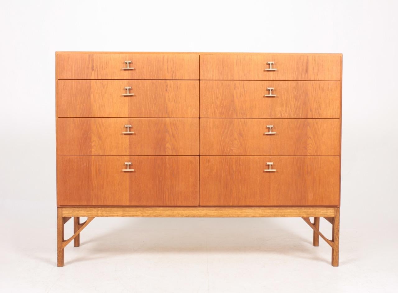 Commode in Scandinavian oak with hardware in brass. Designed by MAA. Børge Mogensen in the 1950s, this piece is made by CM Madsen cabinetmakers, Denmark in the 1960s. Great condition.