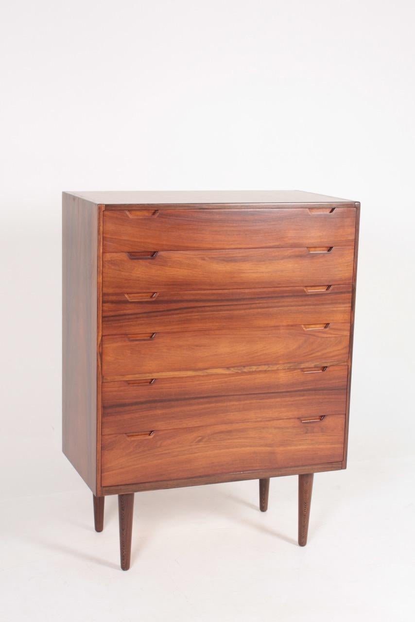 Elegant commode in rosewood designed by Svend Langkilde M.A.A., made in Denmark. Great original condition.