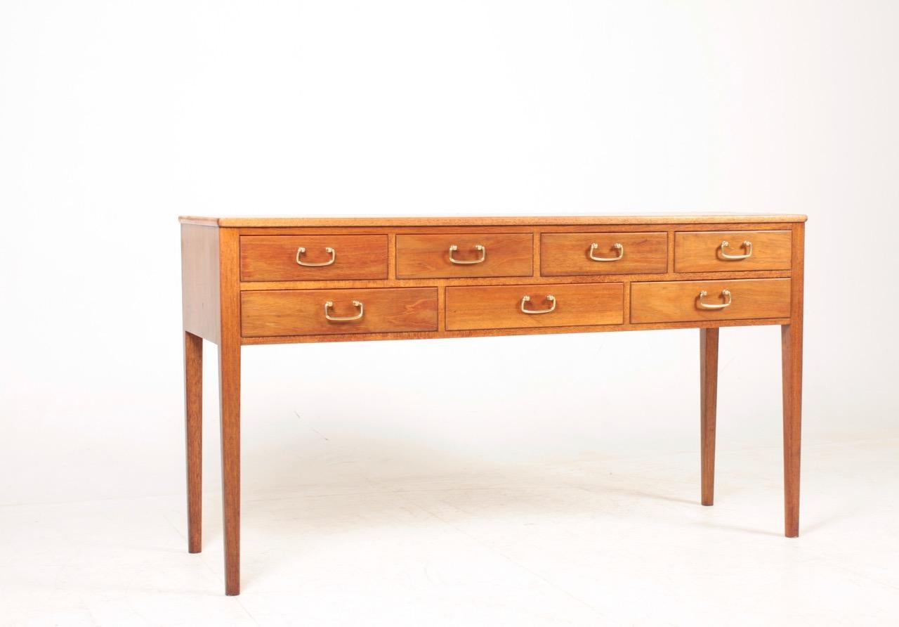 Sideboard in mahogany designed by Frode Holm. Made in Denmark, great original condition.