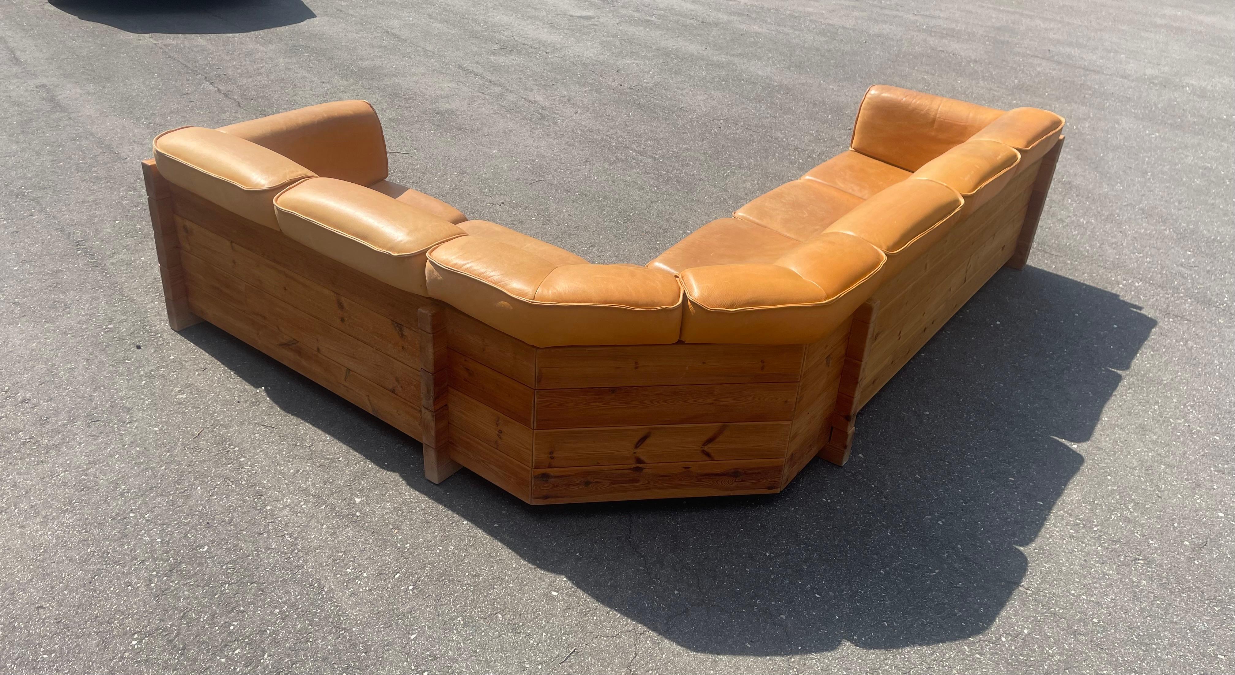 Corner sofa in patinated leather and solid pine. Designed by and made by Christian IV, Denmark, 1960s. Great condition. 
Width 230 cm x 310 cm