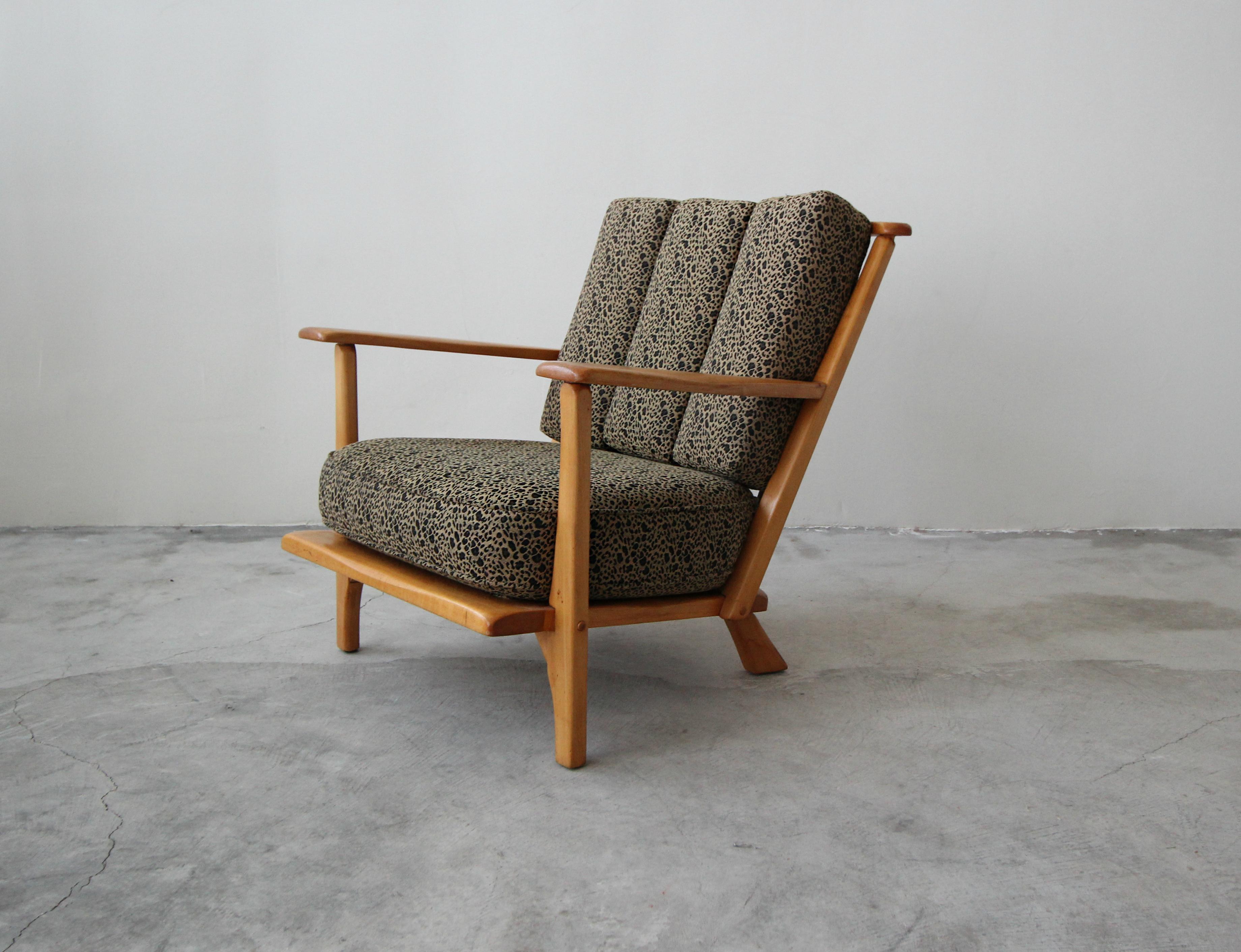 A perfect example of early midcentury craftsmanship at it's finest. Designed by Herman De Vries for Cushman in 1956, it is constructed of solid maple wood with a beautifully angled back, large dowel joints and hand carved legs, no detail was over