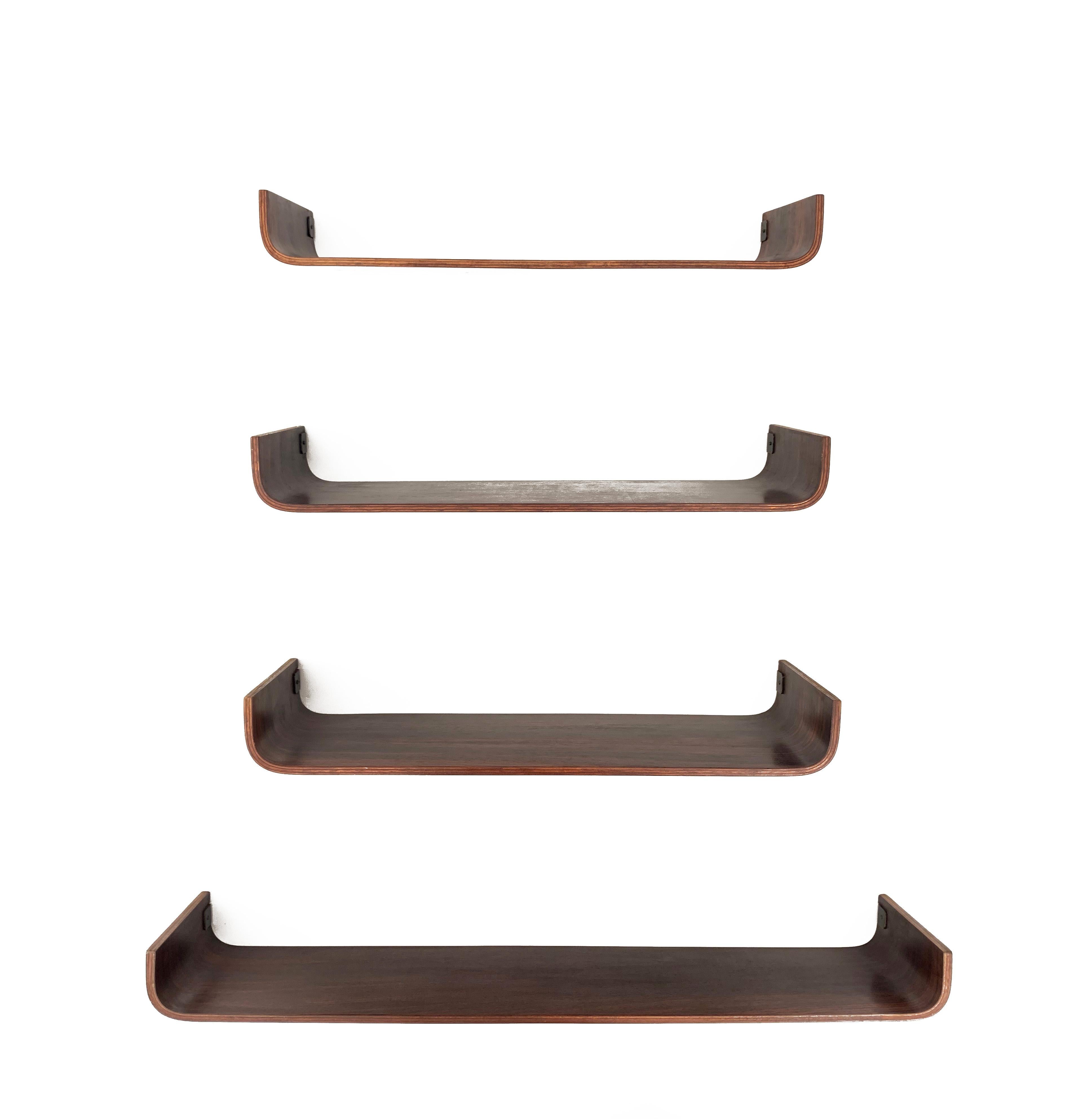 Wonderful set of 4 rosewood shelves, produced by Creazioni Stilcasa in Italy during 1965. The pieces are all labelled 