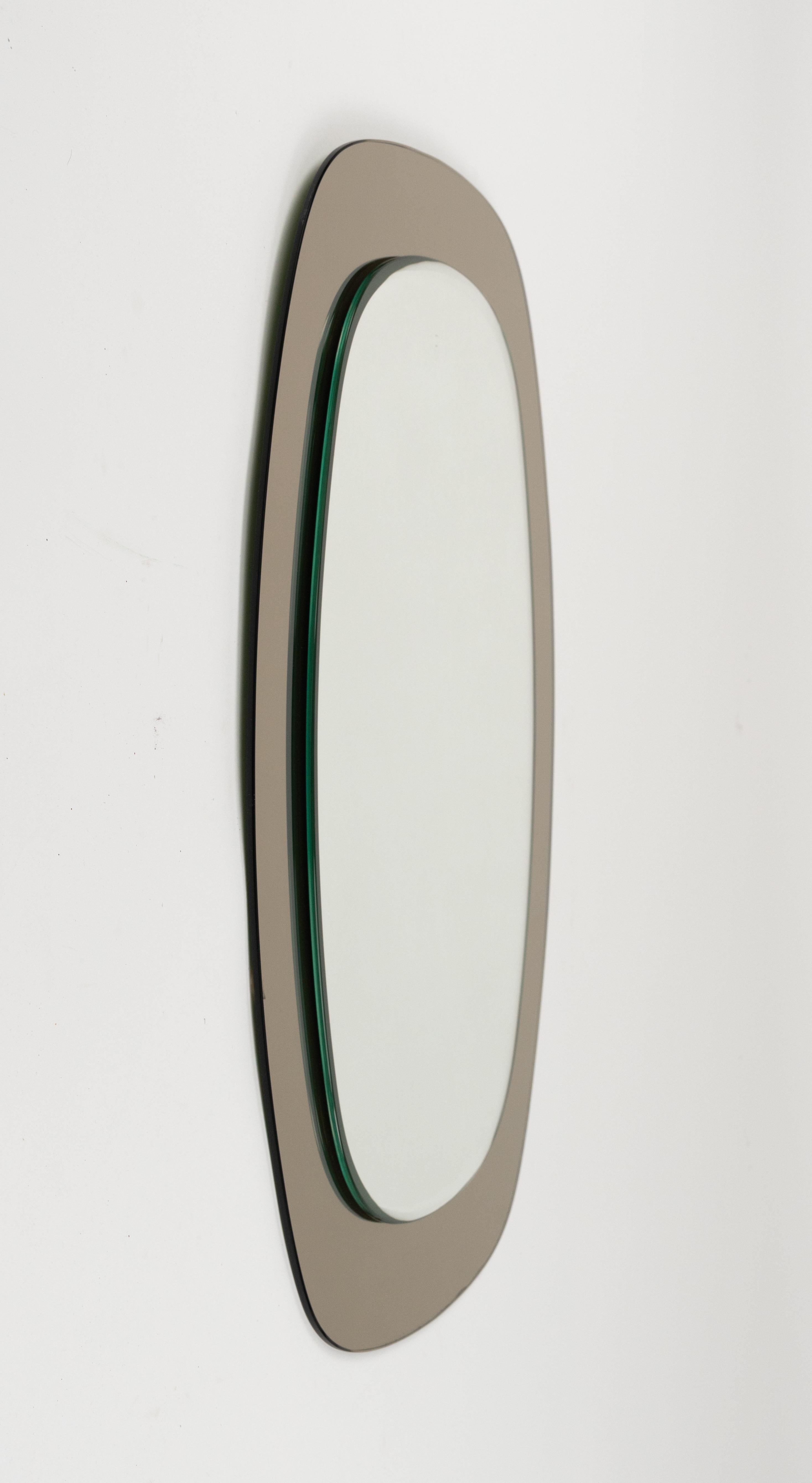 Italian Midcentury Cristal Art Oval Wall Mirror with Smoked Frame, Italy 1960s For Sale