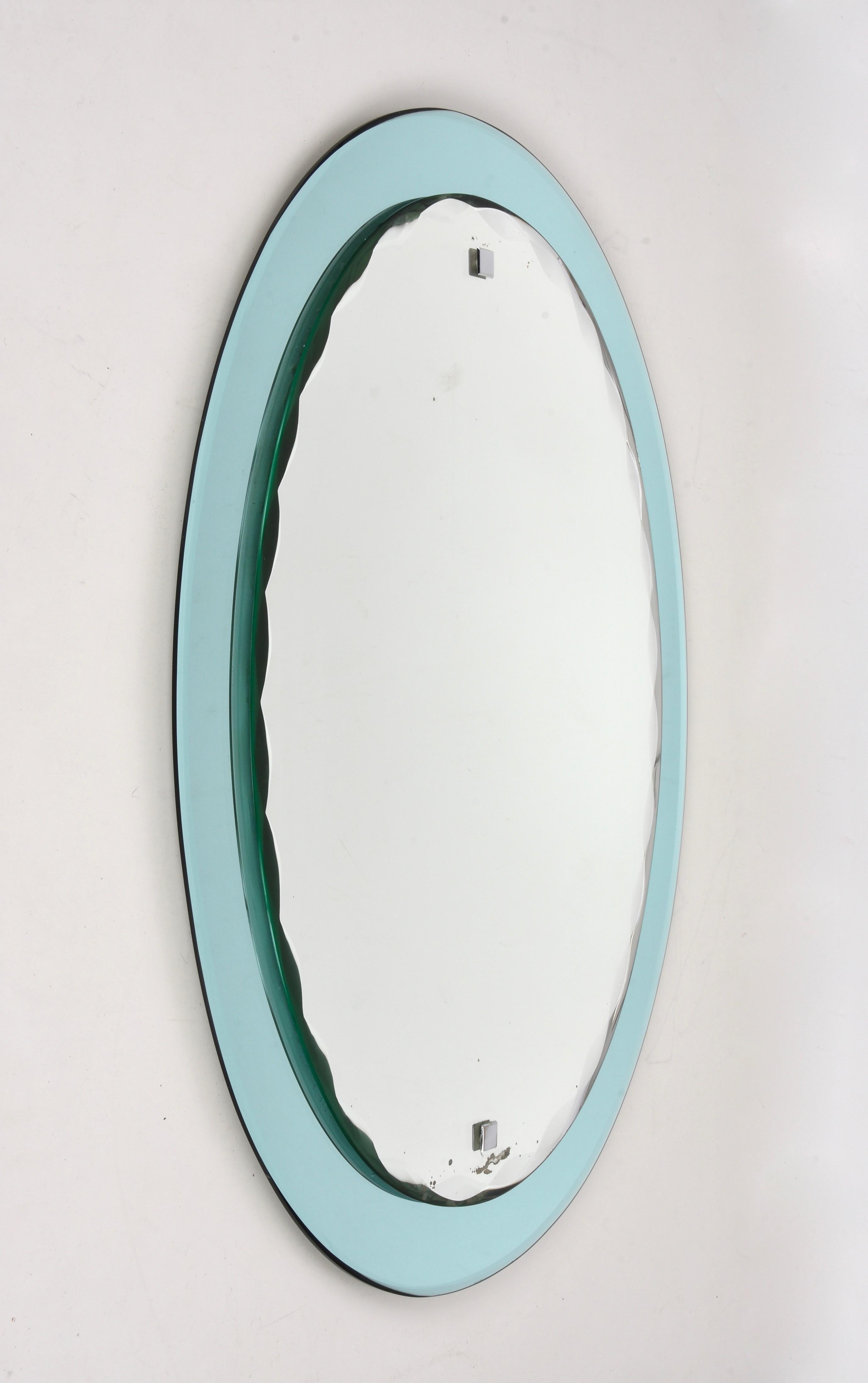 Mid-Century Modern Mid-Century Italian Cristal Arte carved oval mirror, framed, Italy 1960s For Sale