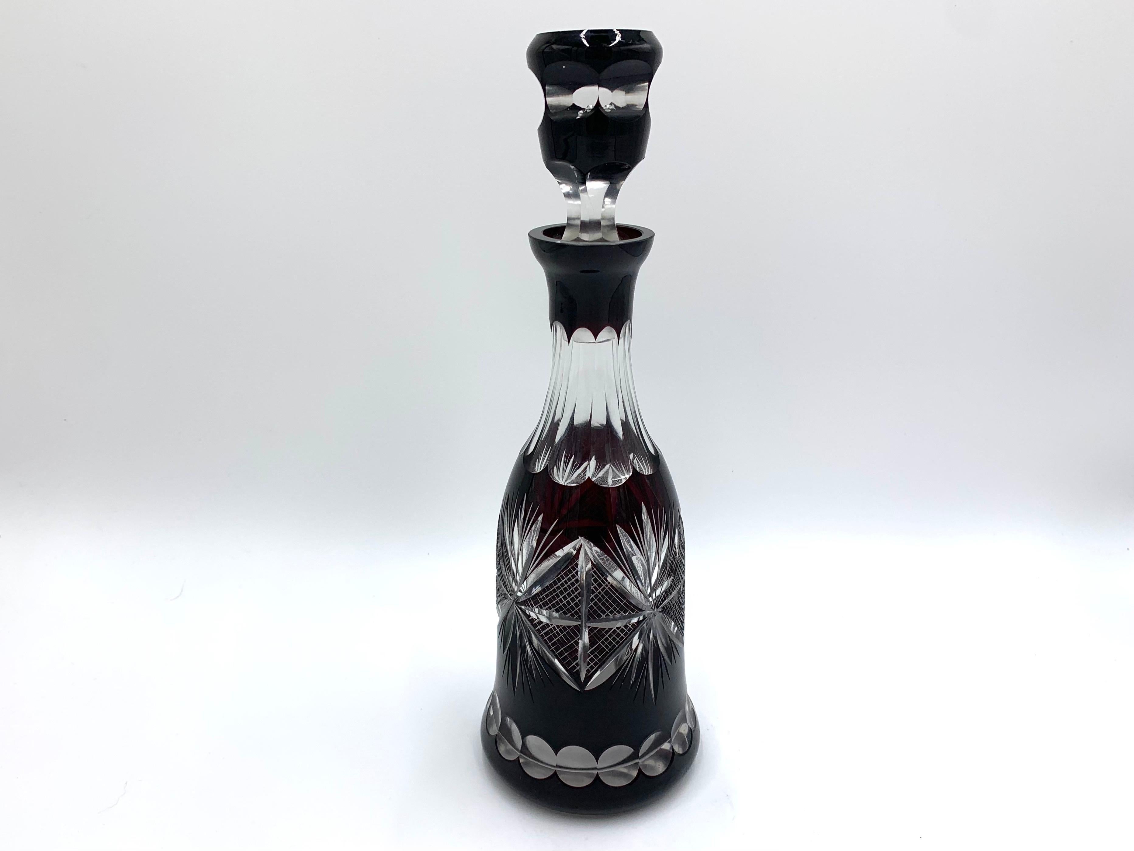 Mid century black ( very dark maroon ) crystal decanter carafe for liquor or vodka. 
Produced in Poland in 1960s 
Very good condition.