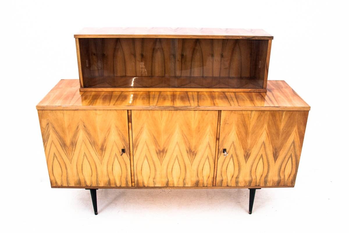 Midcentury vintage cupboard from the 60s of the last century.

Dimensions: H 115 cm / W 155 cm / D. 50 cm.