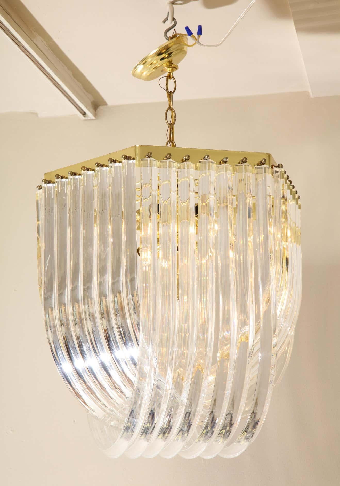 Metal Midcentury Curved Lucite Ribbon Chandelier in Brass For Sale