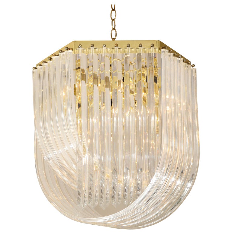 Midcentury Curved Lucite Ribbon Chandelier in Brass at 1stDibs