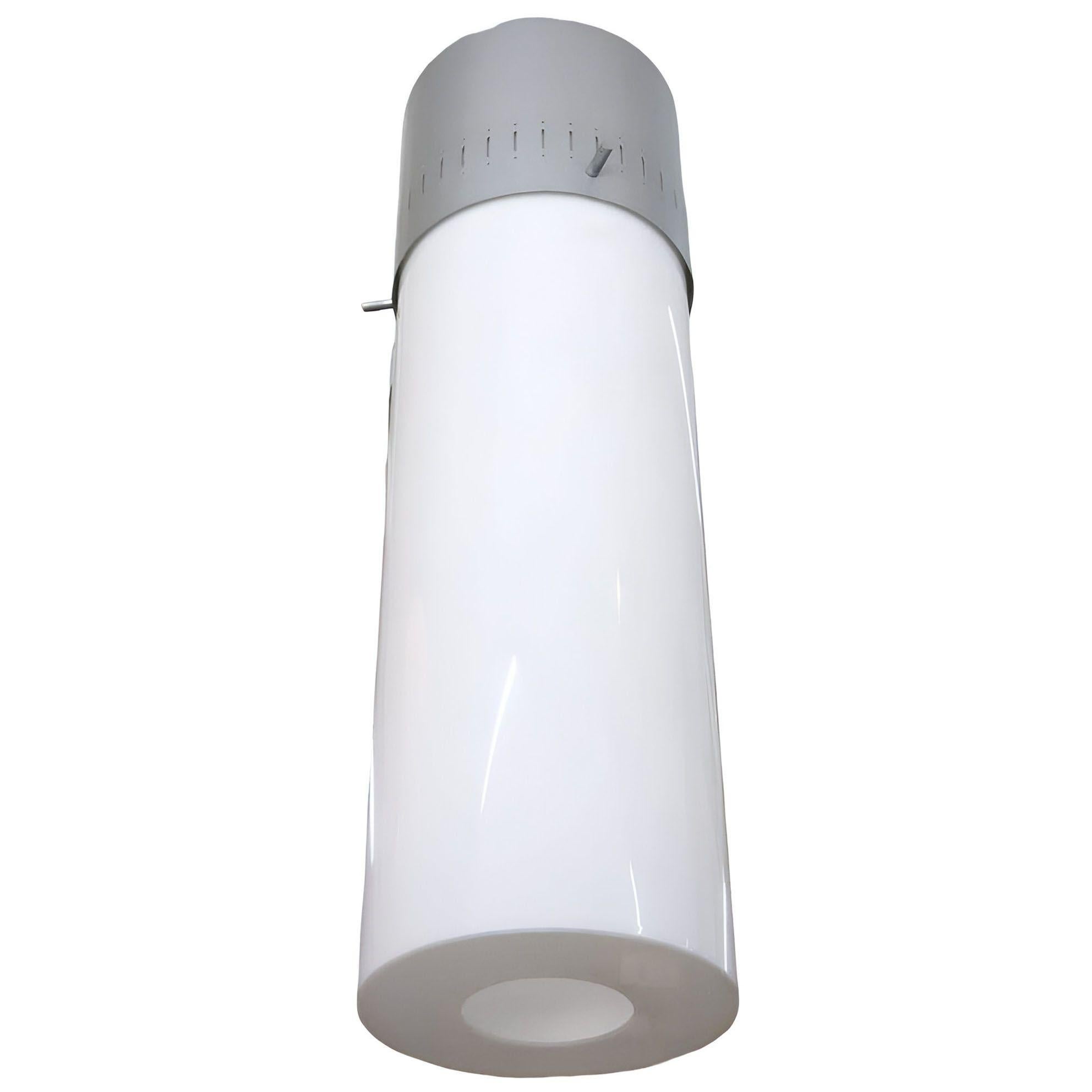 A unique 1958 Mid-century hanging lamp showcasing a vented aluminum cap and a white Lucite cylinder shade. This fixture offers a clean, minimalist look that complements entryways and large rooms. The white acrylic shade provides a warm, diffused