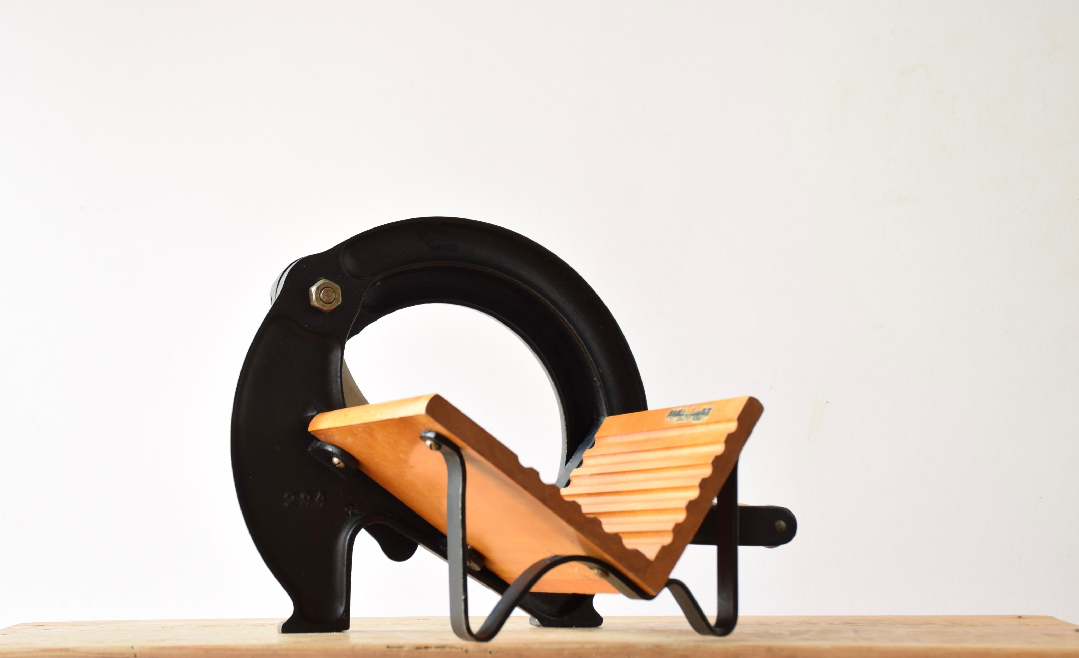 Cast Midcentury Danish Bread Slicer Black and Gold by Ove Larsen for Raadvad, 1950s For Sale