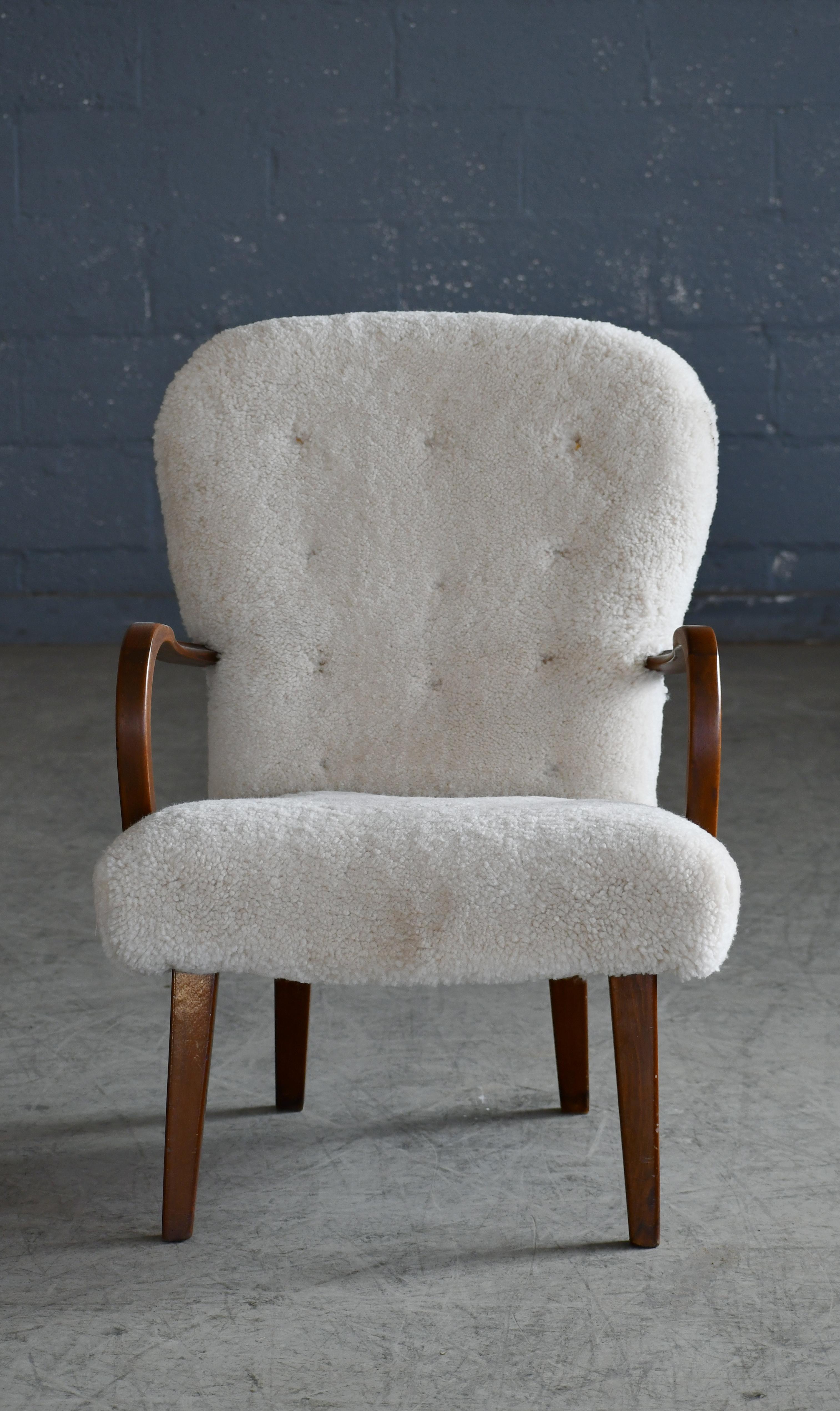 Scandinavian Modern Midcentury Danish Clam Style Lounge Chair in Luxurious Sheepskin, 1950s For Sale