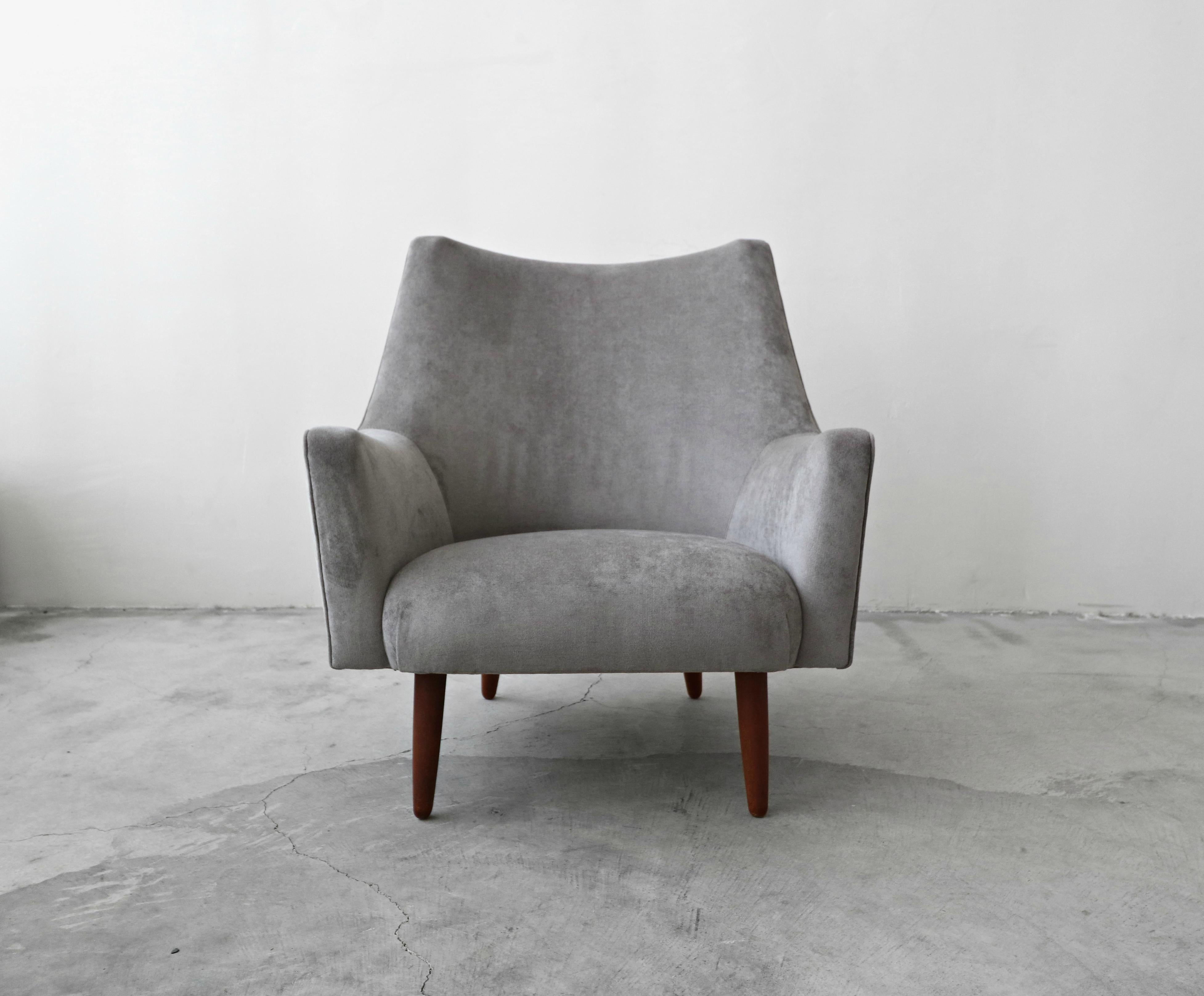 A beautiful midcentury Danish lounge chair. Large enough and stylish enough to stand alone, this gorgeous chair is the perfect one off chair for any room. Designed with Classic Danish craftsmanship, there's not a line that disappoints. A truly