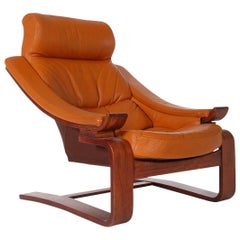 Fauteuil de salon danois moderne du milieu du siècle en cuir cognac d'après Percival Lafer