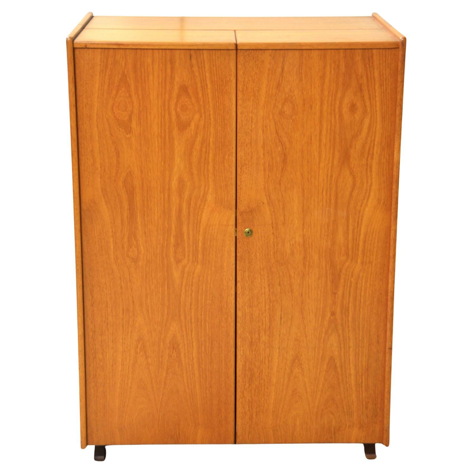 Midcentury teak closable locking teak writing desk called the 