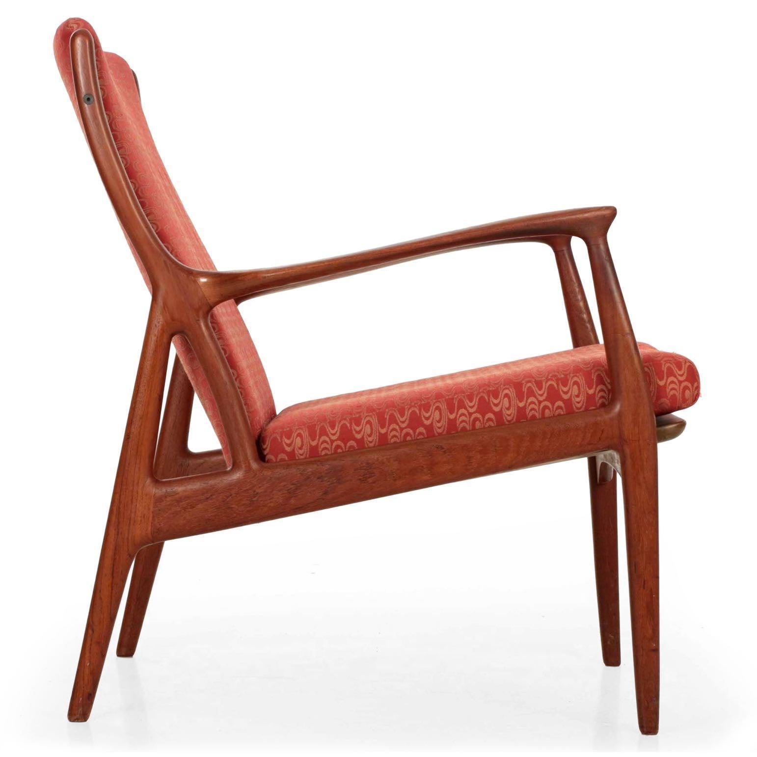 Designed by Erik Kollig Andersen and Palle Pedersen and manufactured by Horsnaes in Denmark, this fine sculpted teak arm chair exhibits exceptional craftsmanship. A distinctly organic form with relentless curvature set against sharp geometry, the
